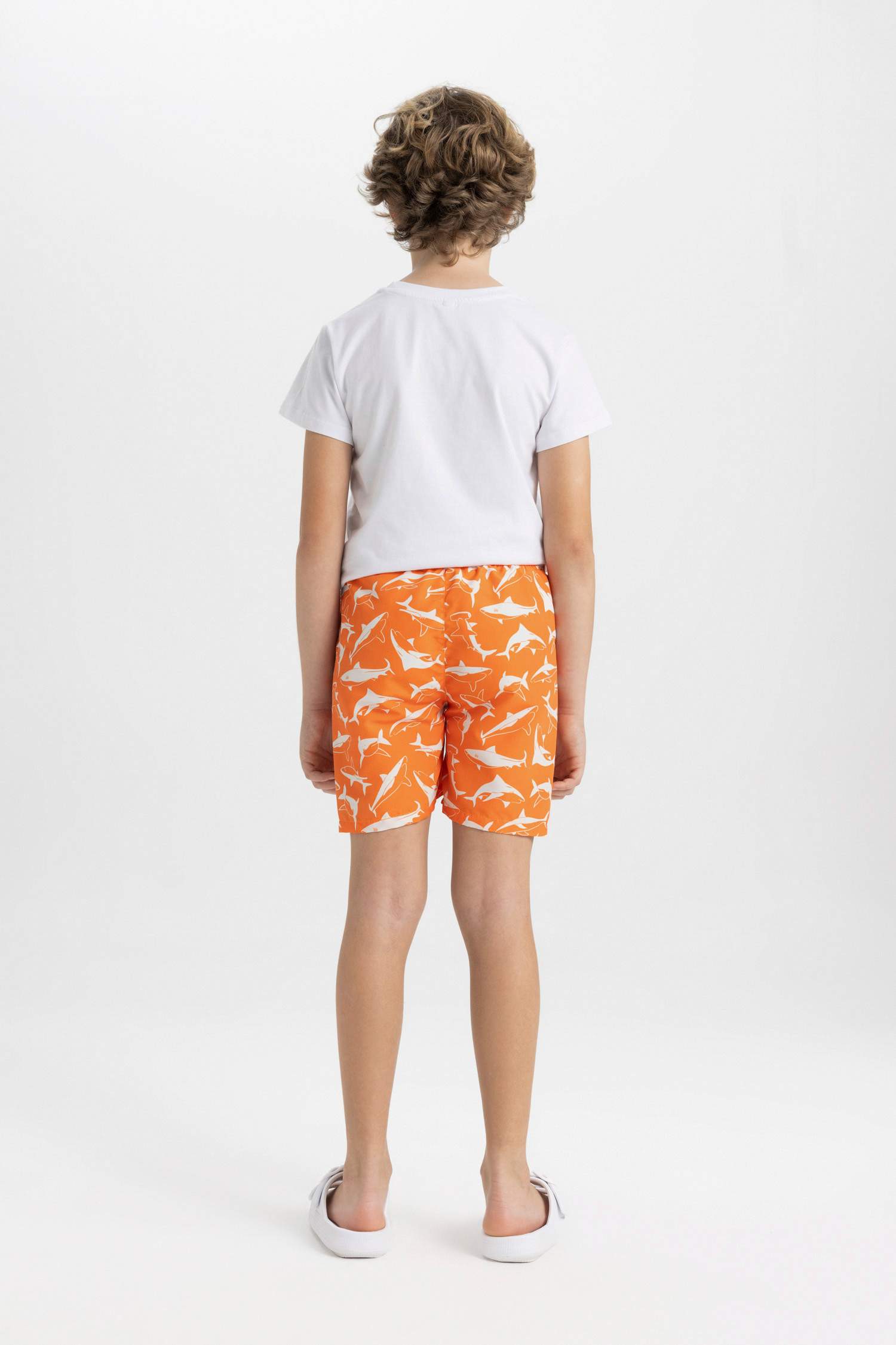 شورت بحر اولادي كحلي بطبعة سمك