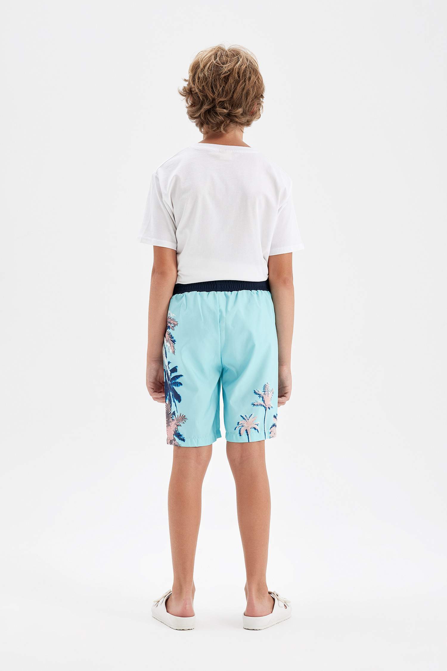 شورت بحر ولادي بطبعة نخيل