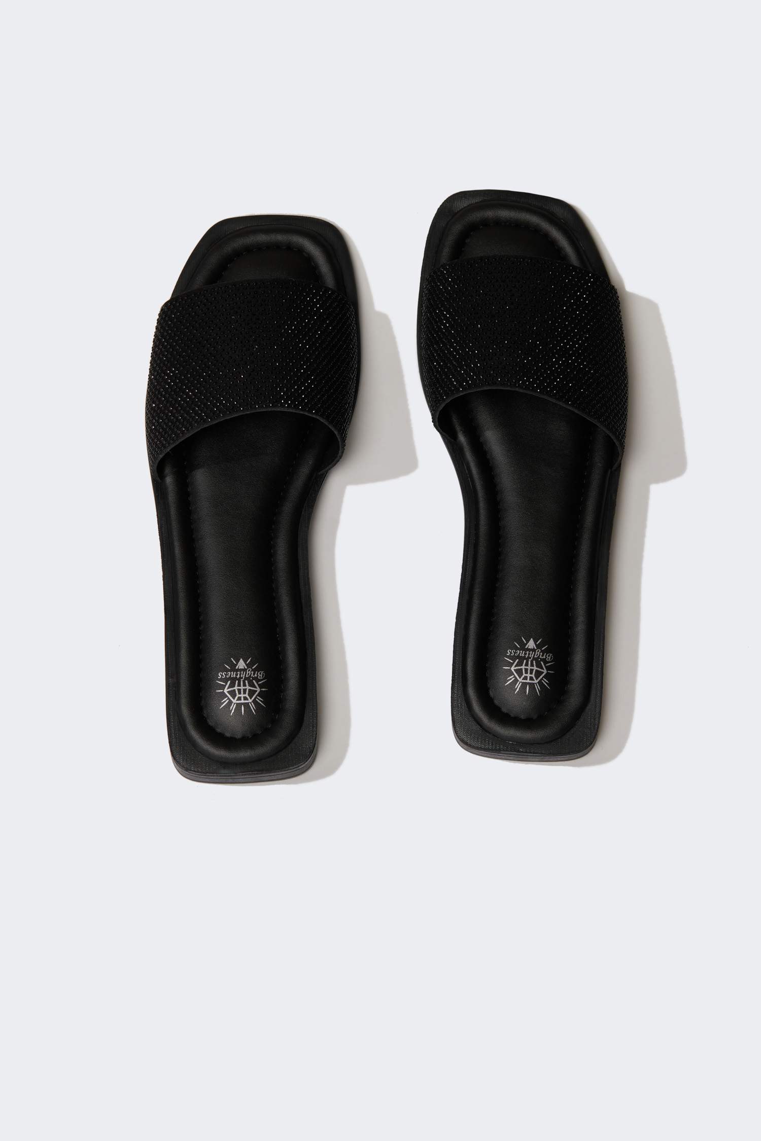 شبشب نسائي بكعب مسطح بشريط مفرد