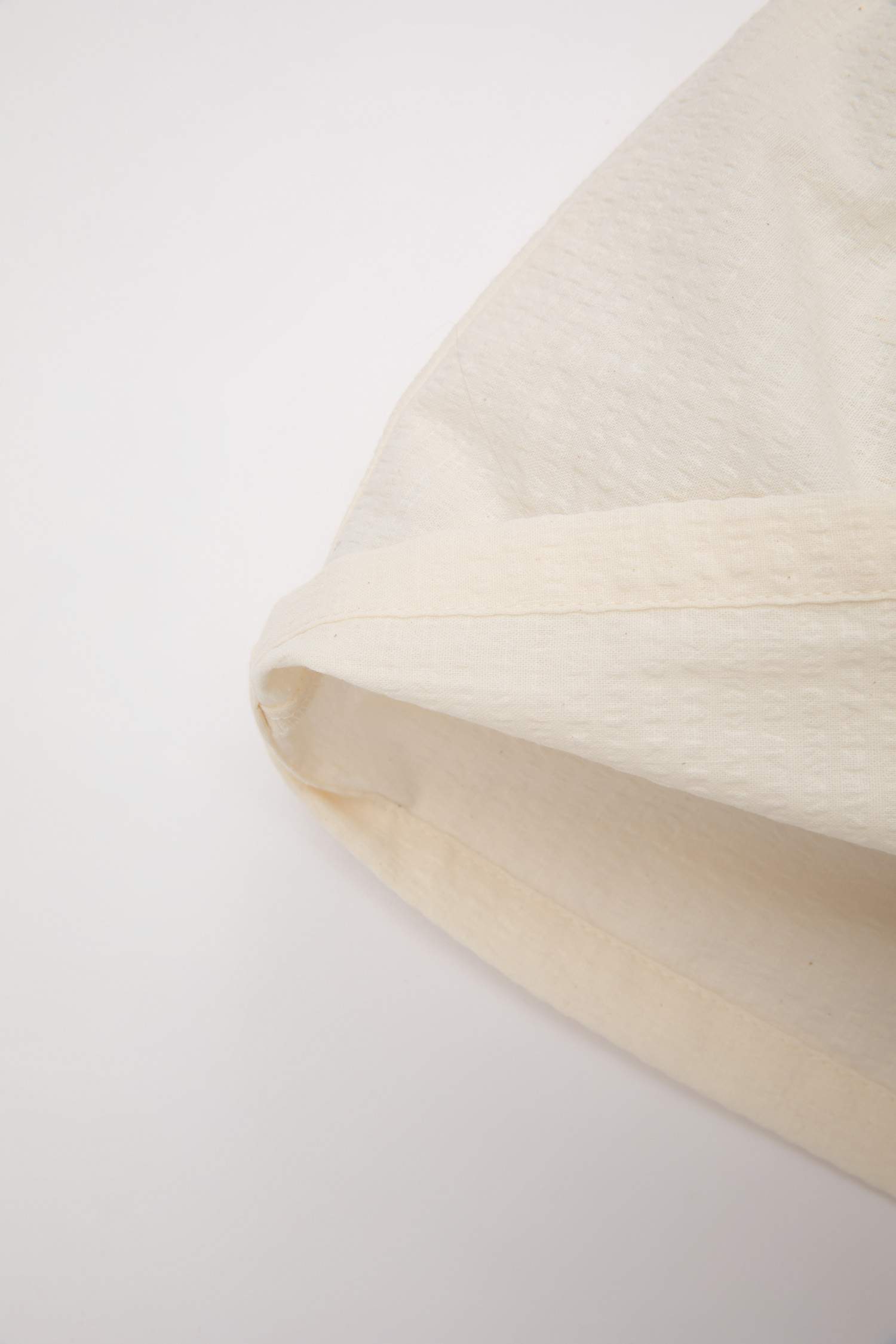 قميص بناتي نص ردن ذو مظهر كتان