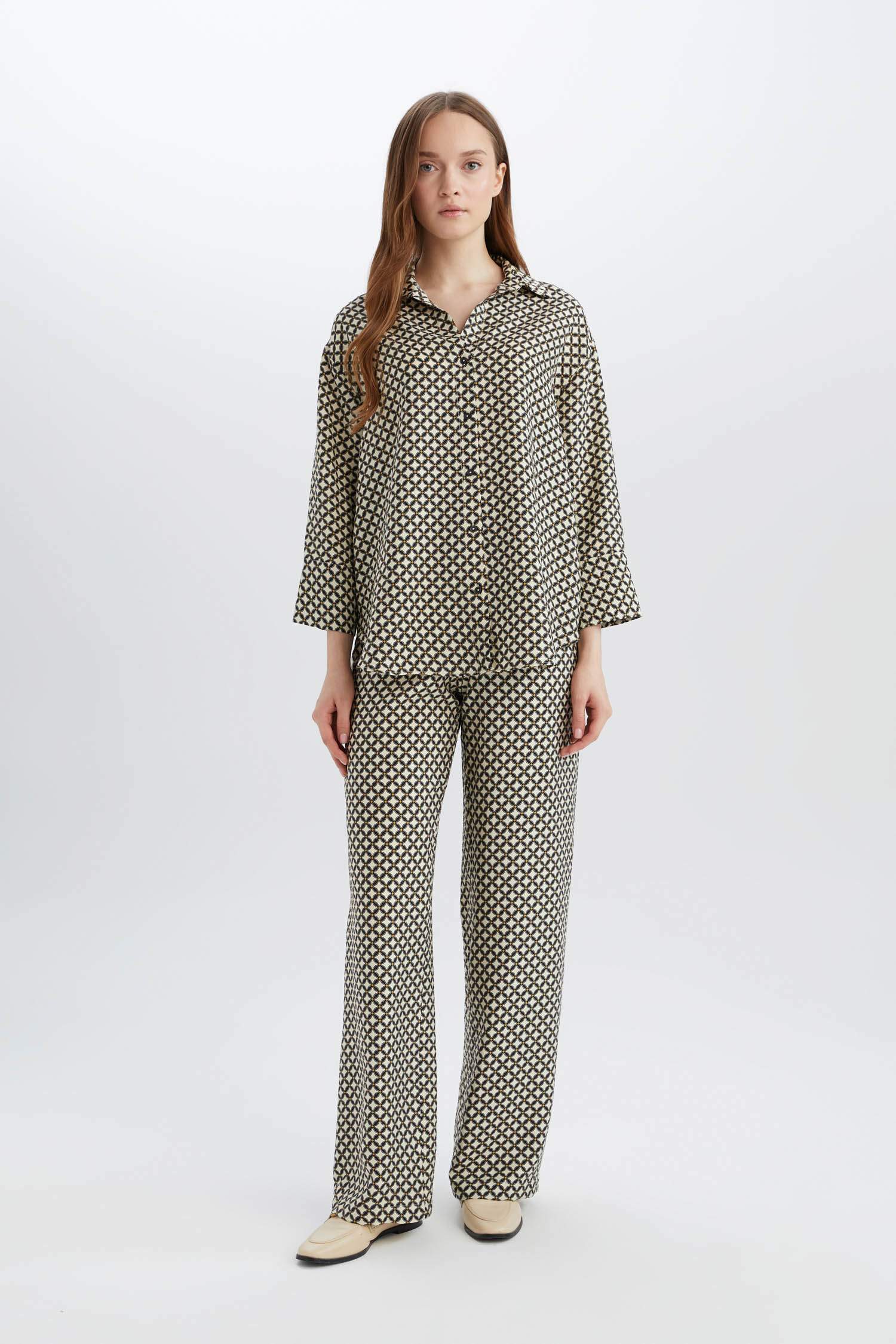 قميص ردن طويل منقوش قصة عادية