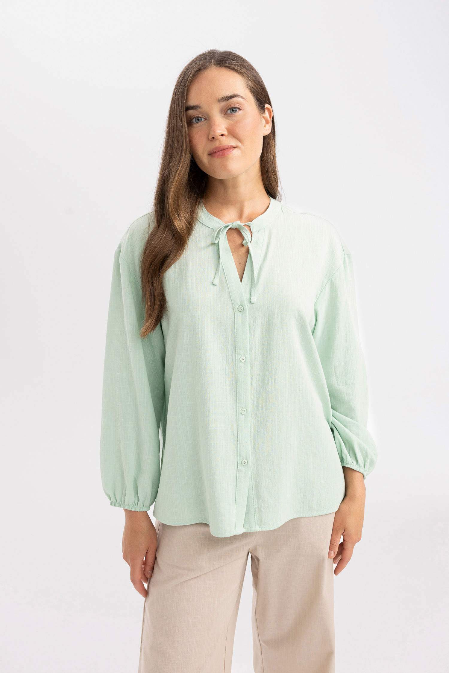 بلوزة كم طويل قصة عادية برقبة مستديرة