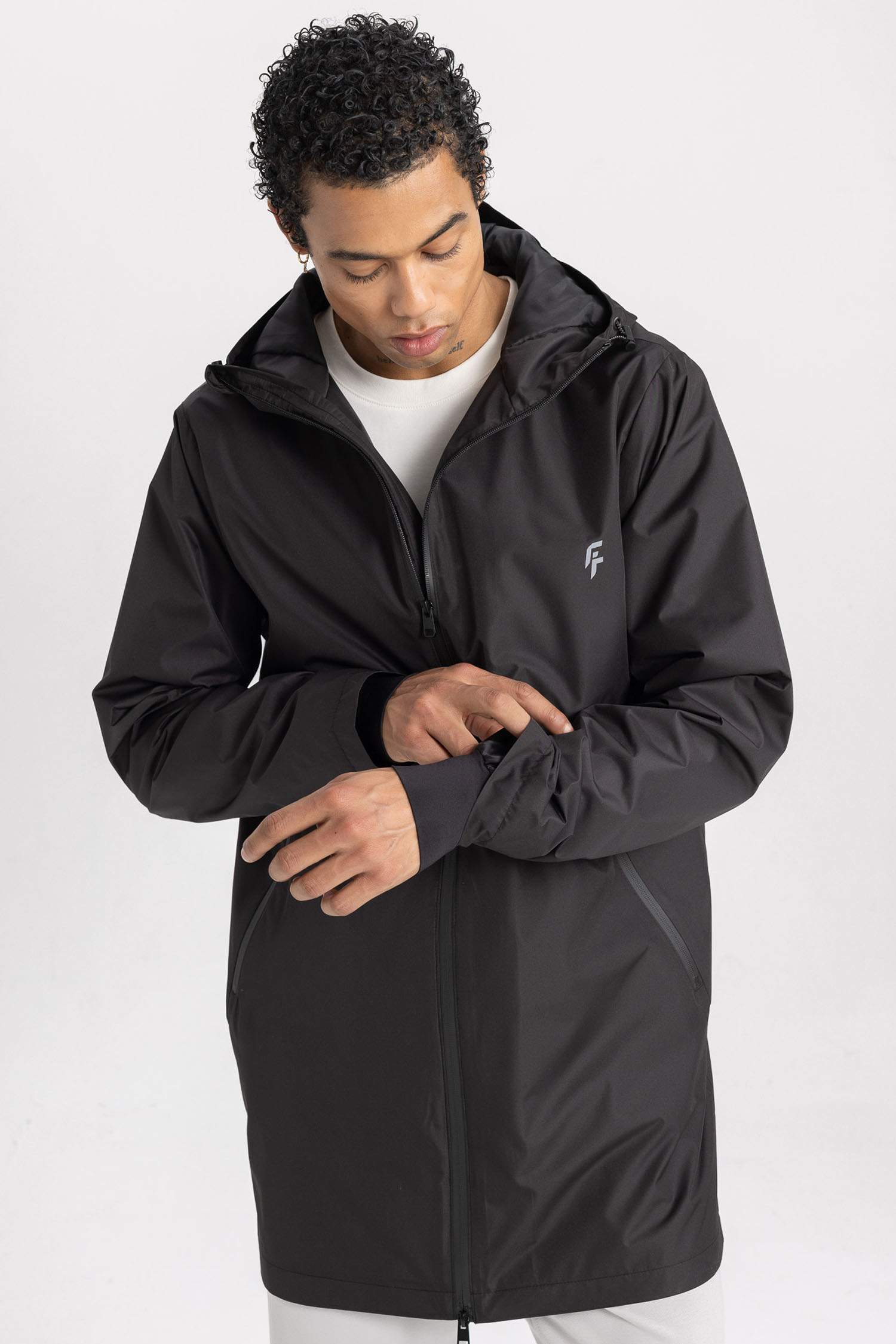 بالطو مطر قصة عادية بغطاء للرأس طارد للماء من DeFactoFit