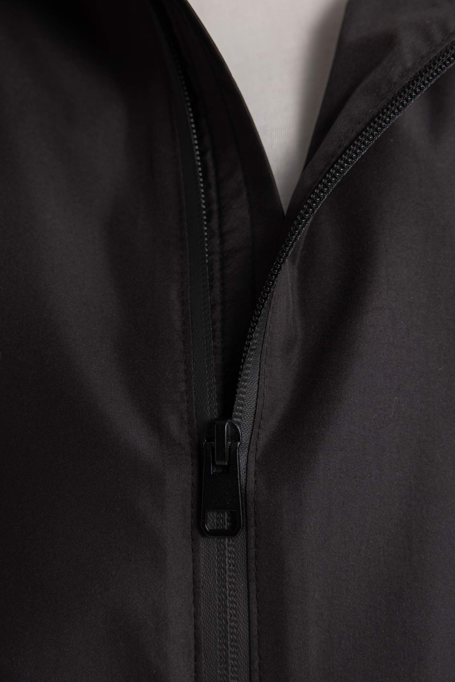 بالطو مطر قصة عادية بغطاء للرأس طارد للماء من DeFactoFit