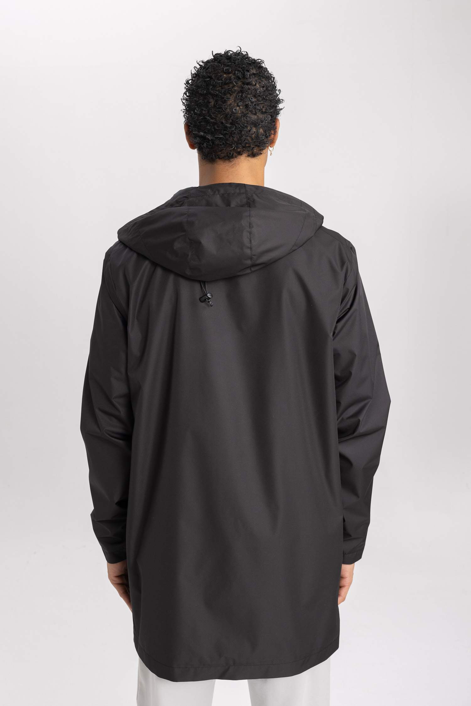 بالطو مطر قصة عادية بغطاء للرأس طارد للماء من DeFactoFit