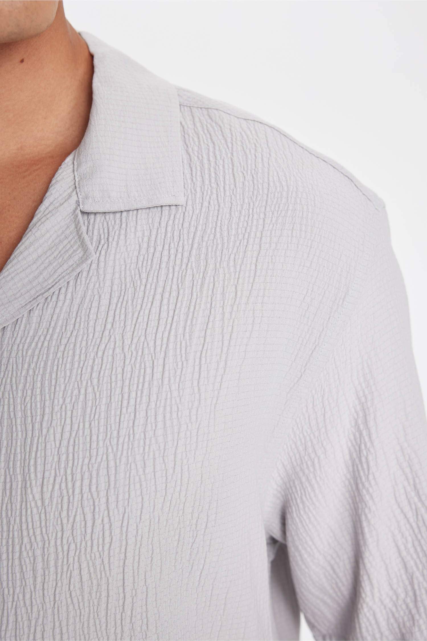 قميص بولو نص ردن محبوك قصة مريحة