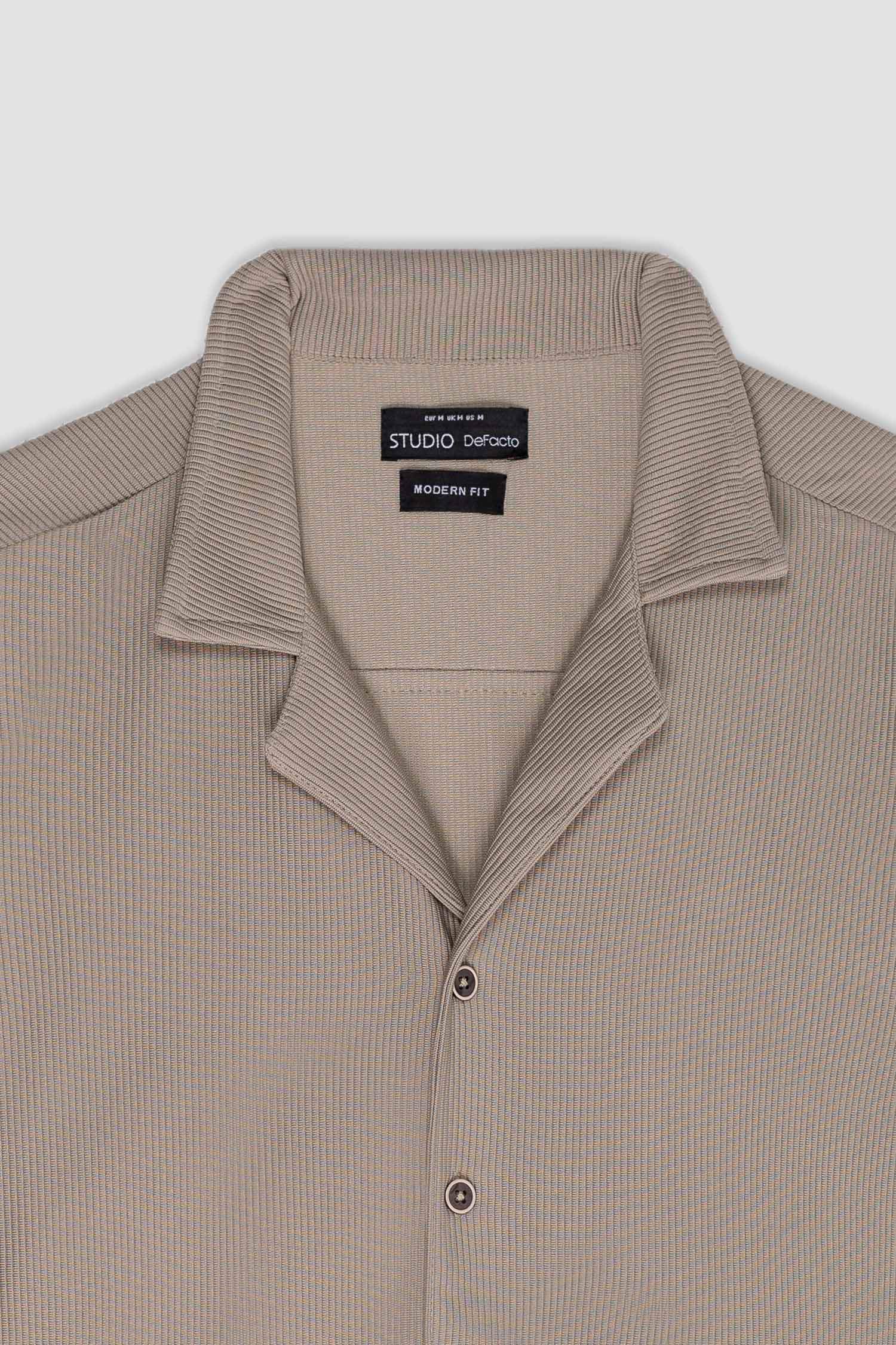 قميص بولو نص كم محبوك مودرن فيت