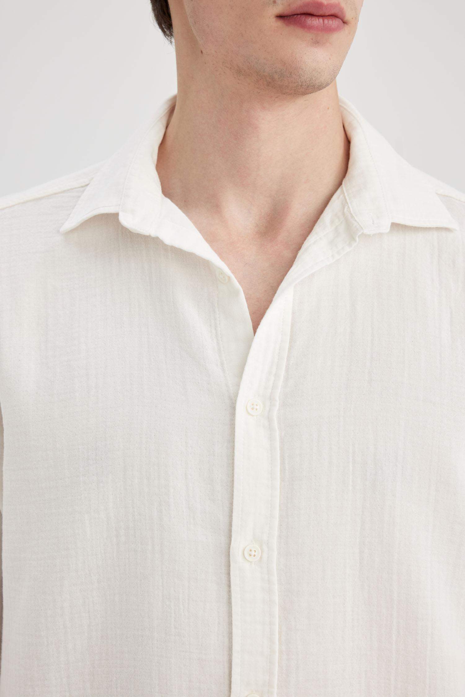 قميص بولو قطن كم طويل قصة عادية