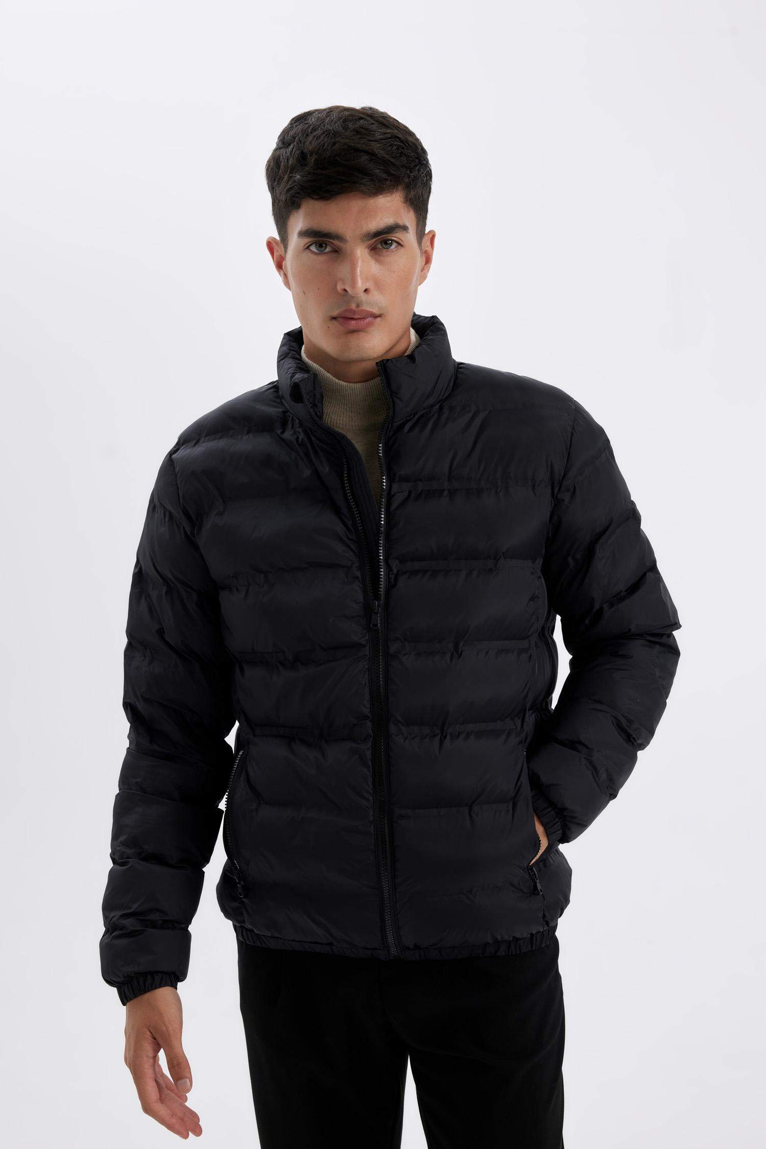 Doudoune zippée à col montant avec poches Coupe régulière