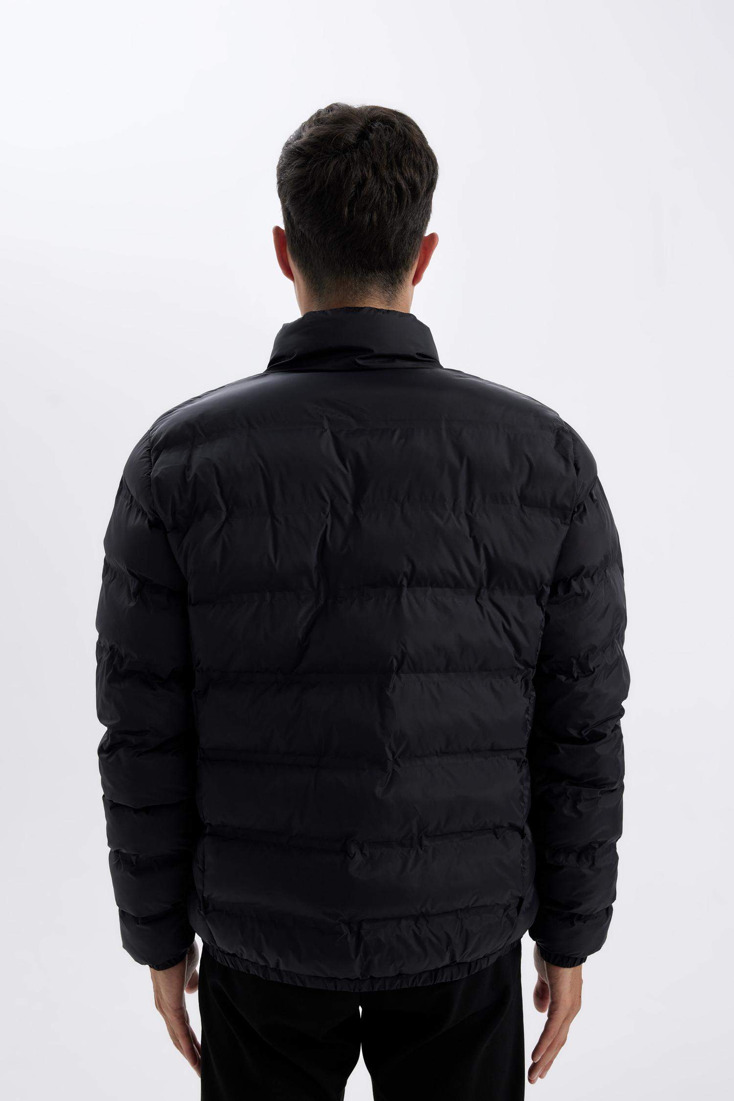 Doudoune zippée à col montant avec poches Coupe régulière