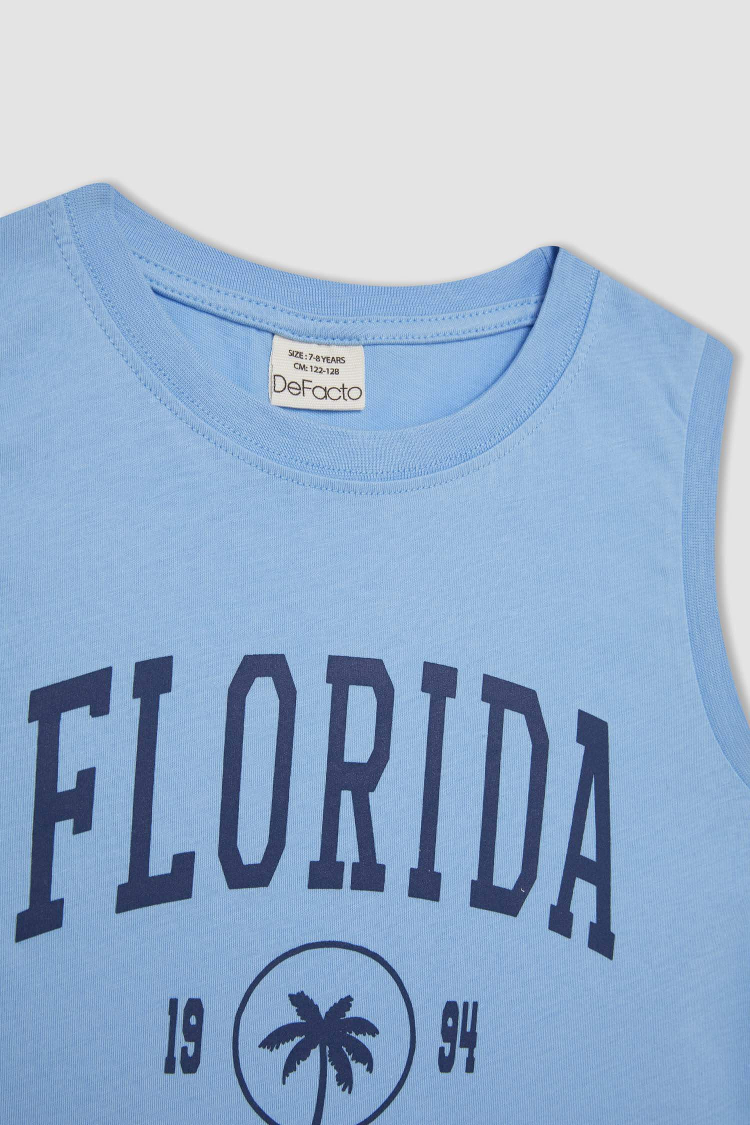 تيشيرت كت ولادي قصة عادية بدون ردن وياخة مستديرة