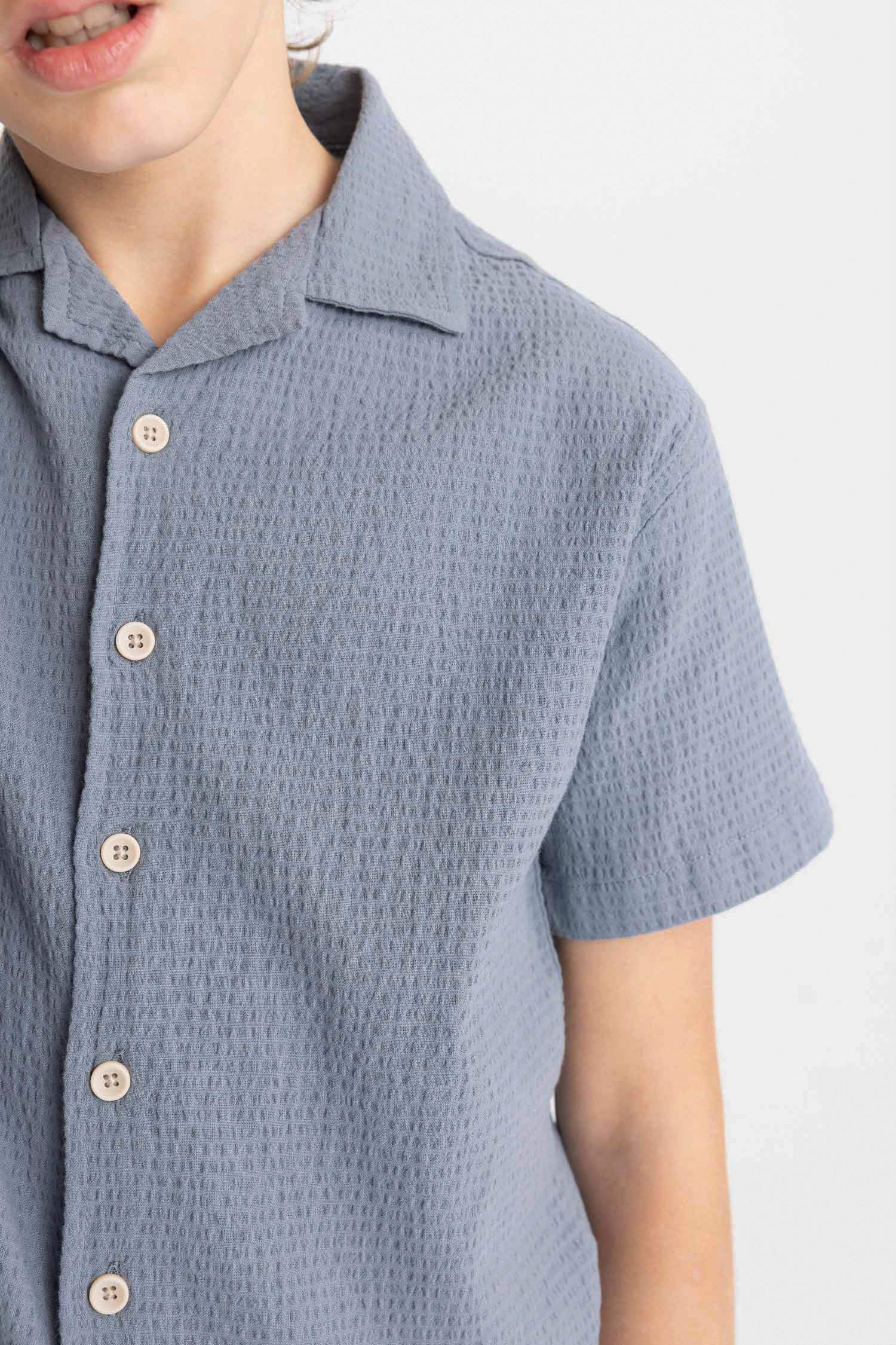 قميص بولو نص كم منسوج اوفر سايز