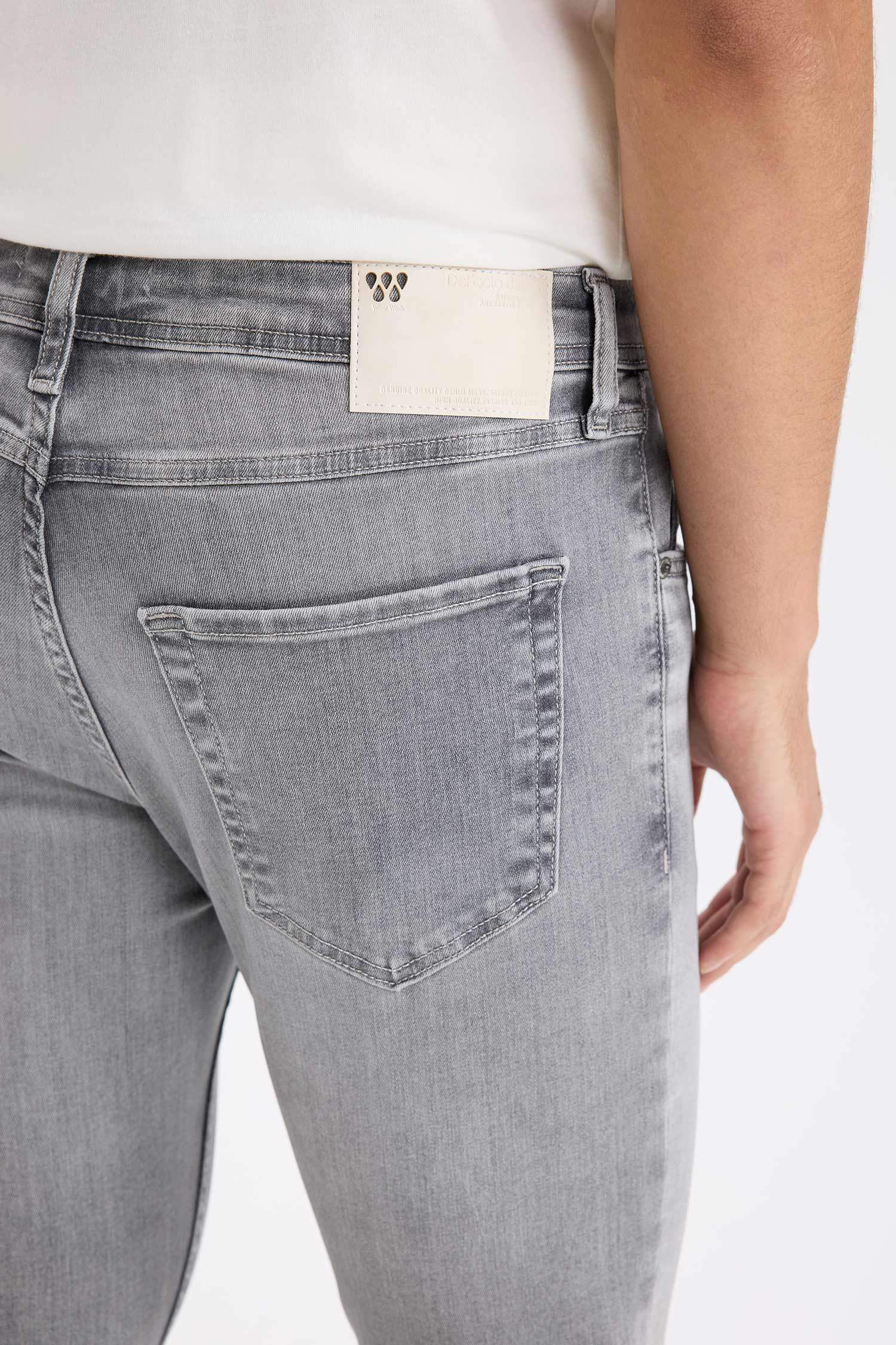 سروال جينز كارلو سكيني فيت بخصر عادي