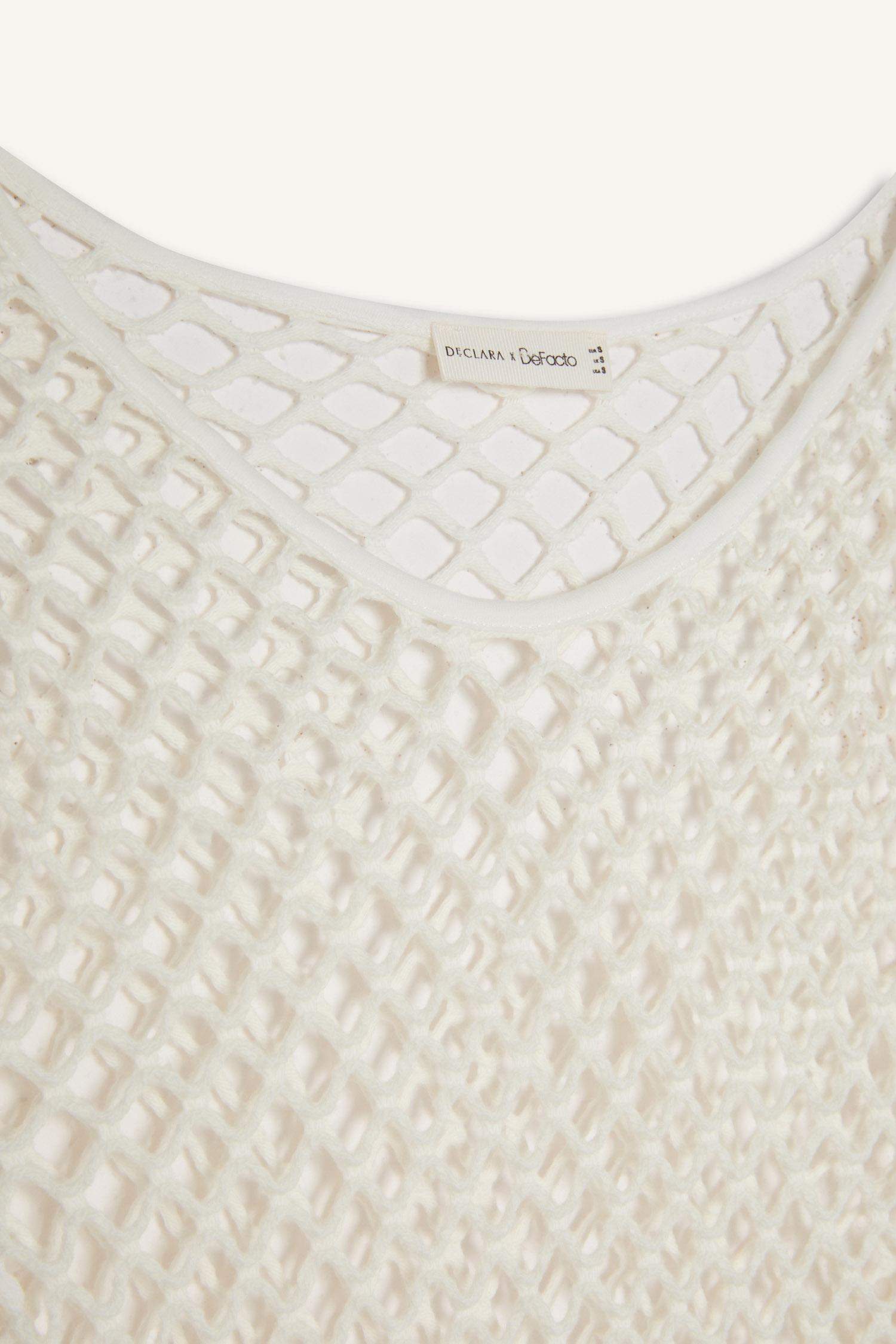 بلوزة للبحر كروب شبكي قصة عادية من Declara x DeFacto