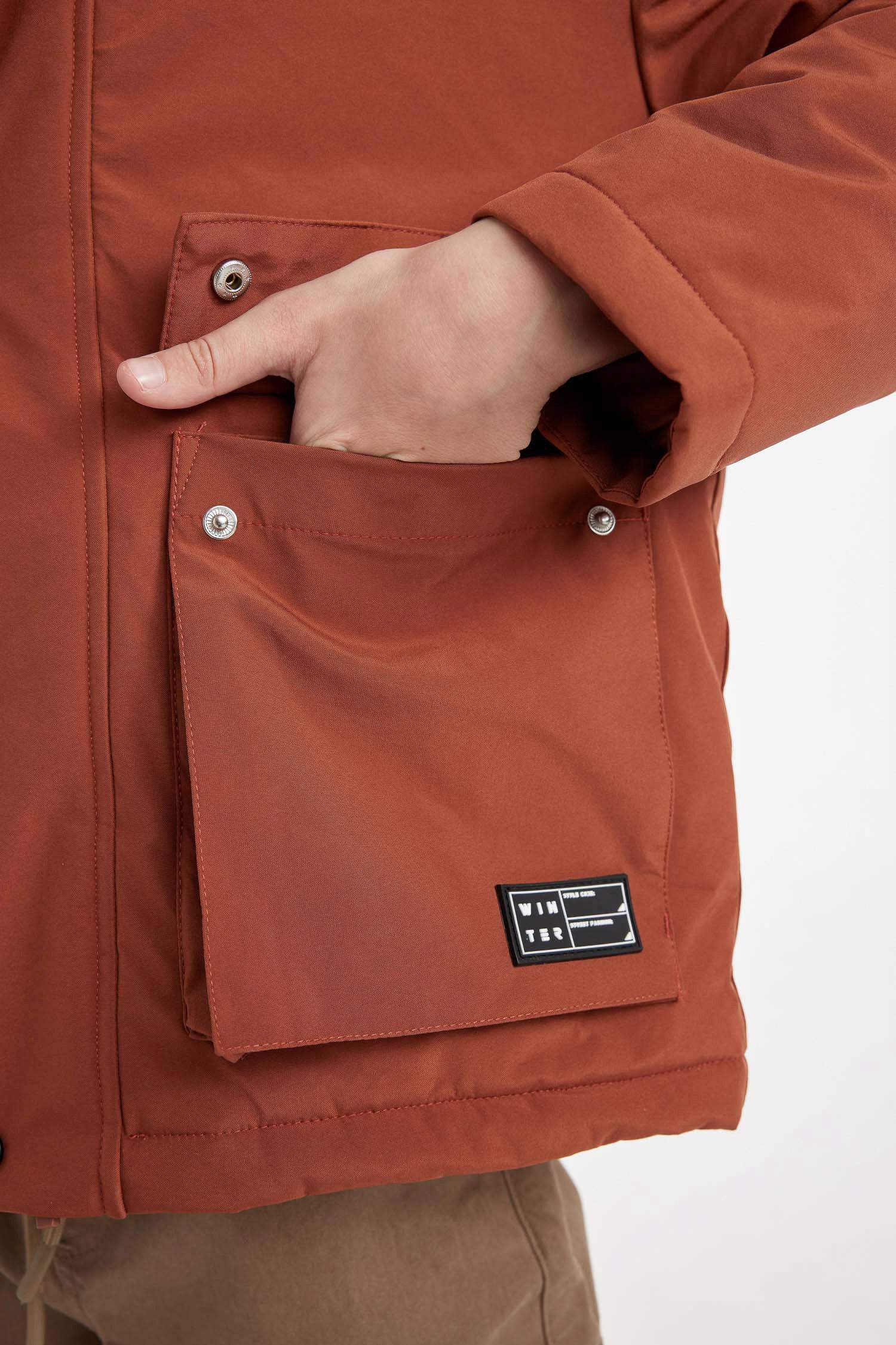 قمصلة نفخ ولادي بغطاء للرأس