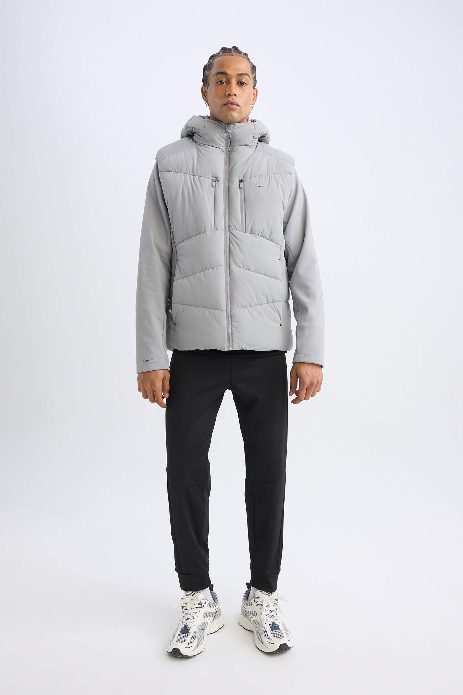 قمصلة نفخ قصة عادية بغطاء للرأس مقاوم للماء من DeFactoFit