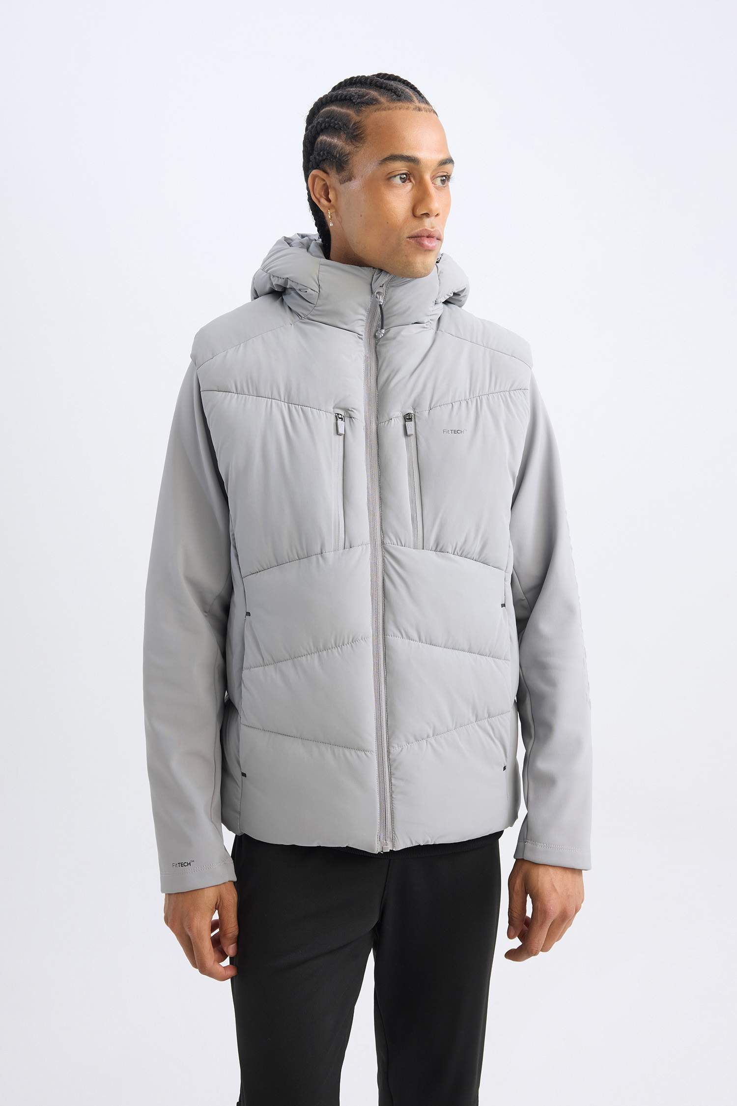 قمصلة نفخ قصة عادية بغطاء للرأس مقاوم للماء من DeFactoFit