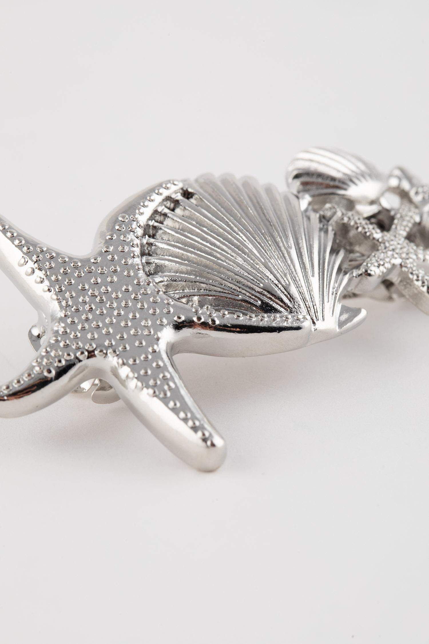 كلبس شعر نسائي فضي