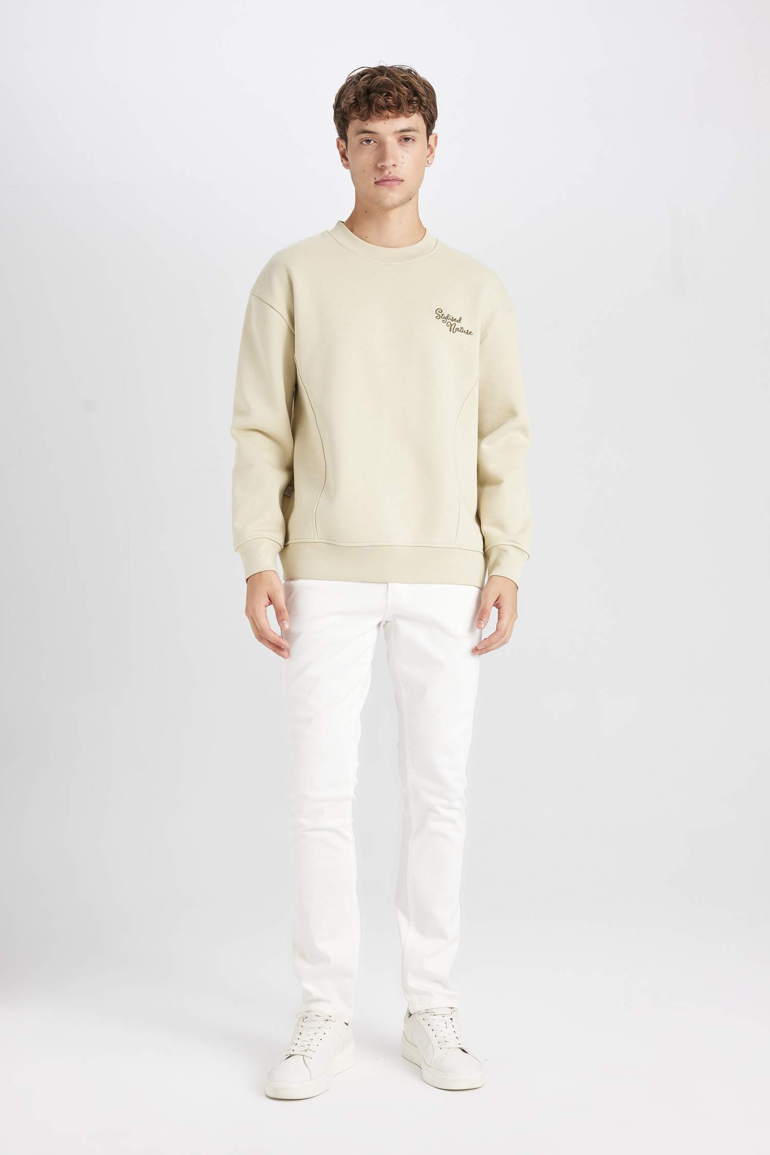 سويت شيرت اوفر سايز بطبعة شعار