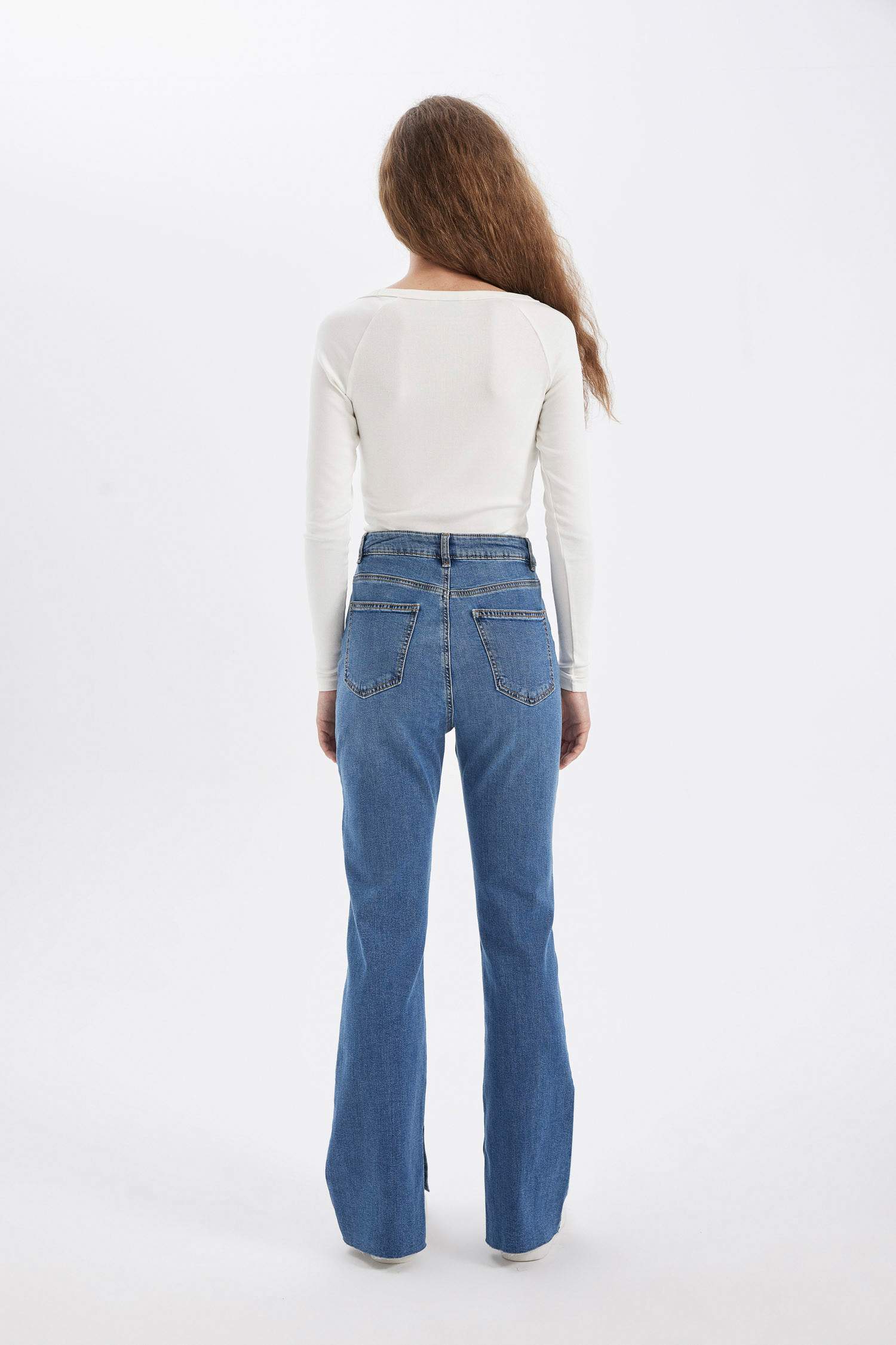 Slim Flare Normal Bel Yırtmaçlı Uzun Jean Yıkamalı Pantolon