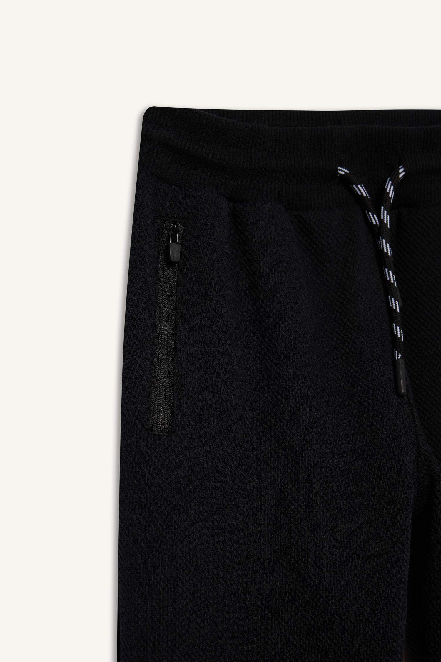 بنطلون سويت بانتس جوجر اولادي قصة عادية بأستك من تحت