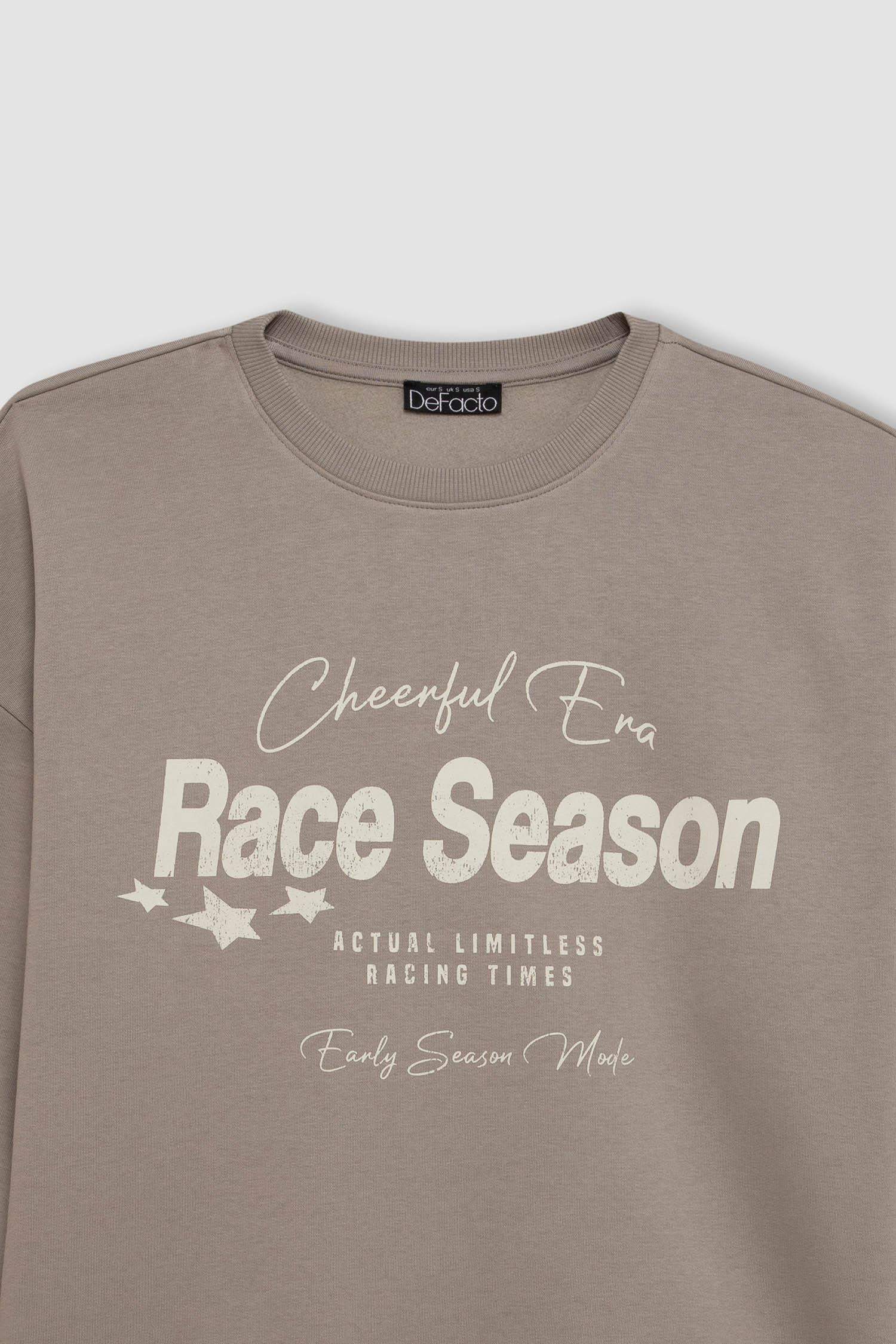 سويت شيرت قصة فضفاضة برقبة مستديرة