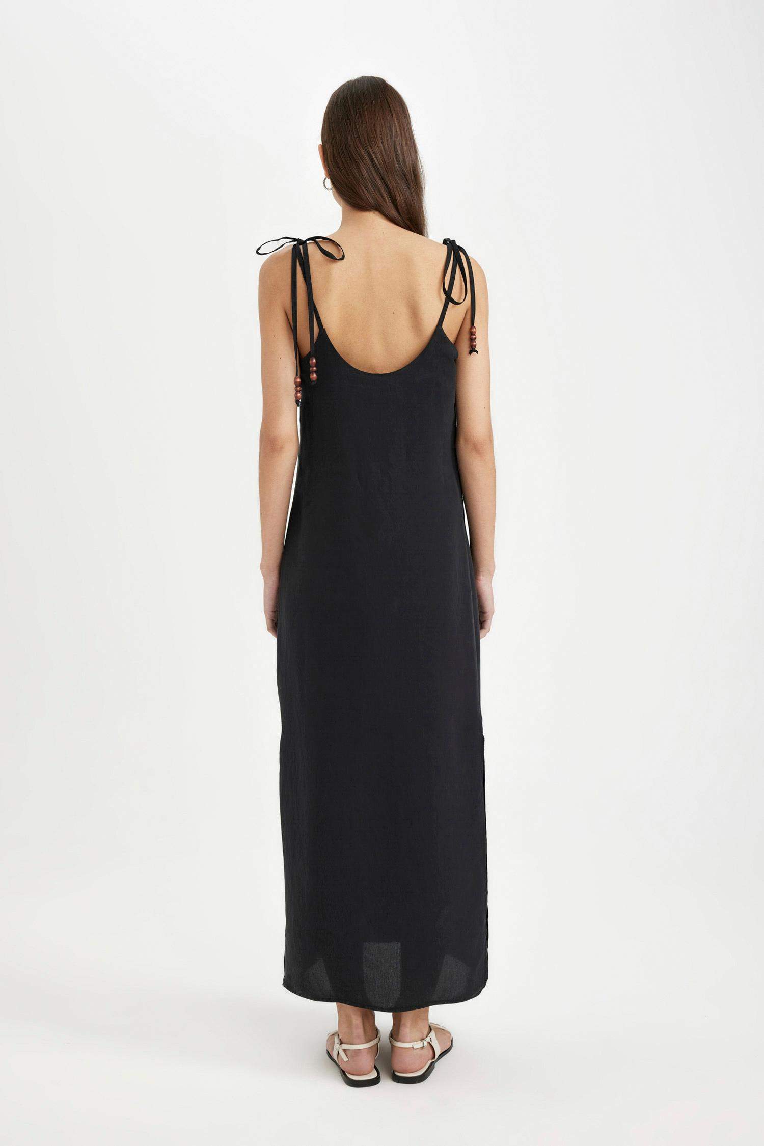 فستان ميدي اسود نص كم قصة مستقيمة بدون كم