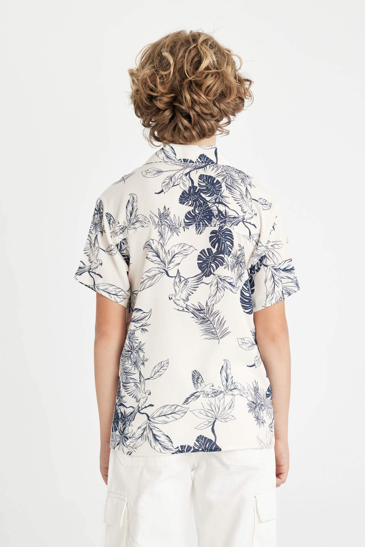 قميص بولو ولادي نص ردن فيسكوز قصة عادية