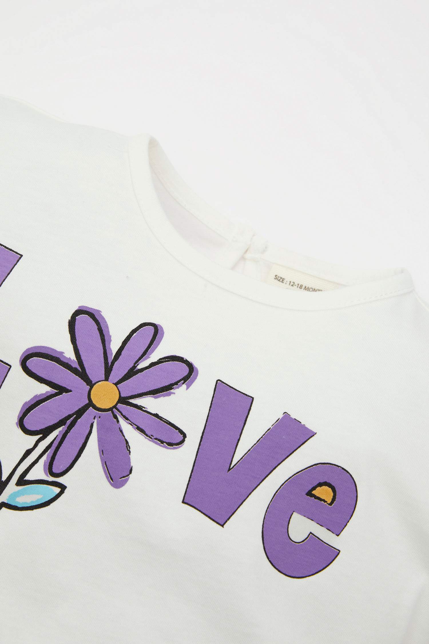 طقم بيبي بناتي شورت وتيشيرت فلورال وافل قصة عادية - قطعتين