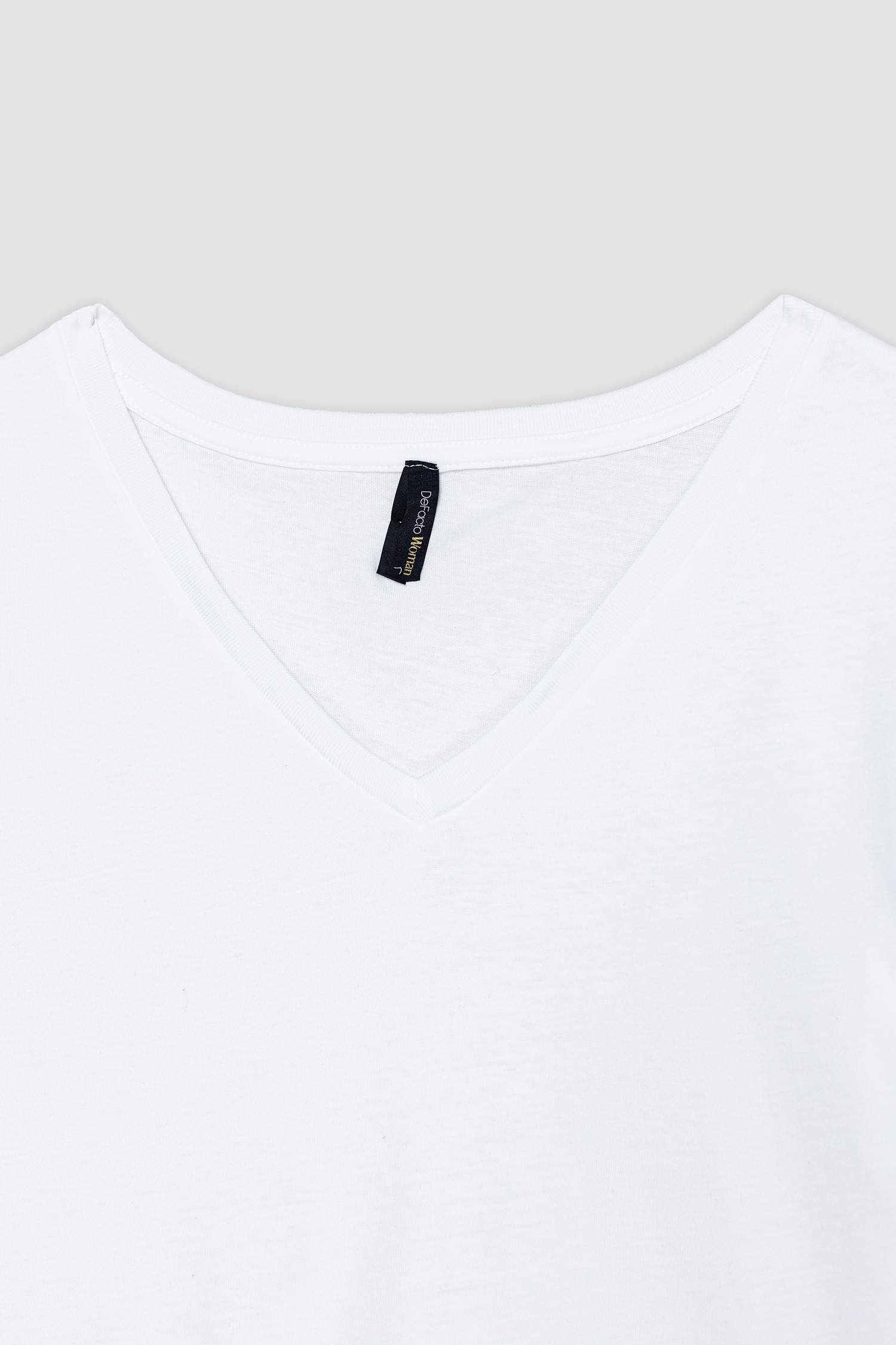 T-shirt en coton peigné à col en V et manches courtes Coupe régulière