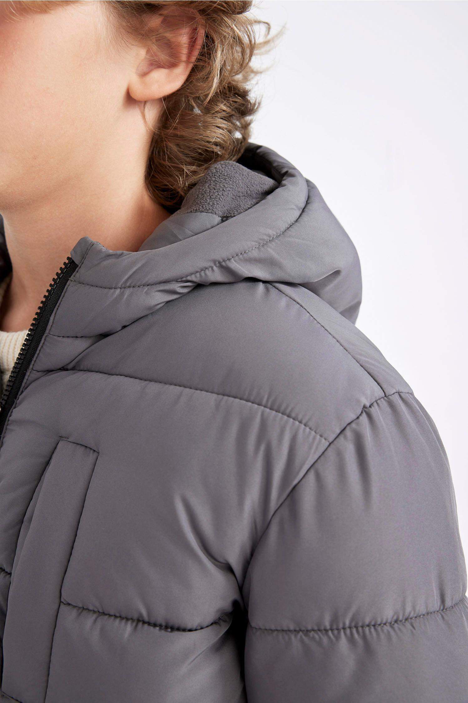 قمصلة نفخ ولادي مقاوم للماء بغطاء للرأس ببطانة فروية