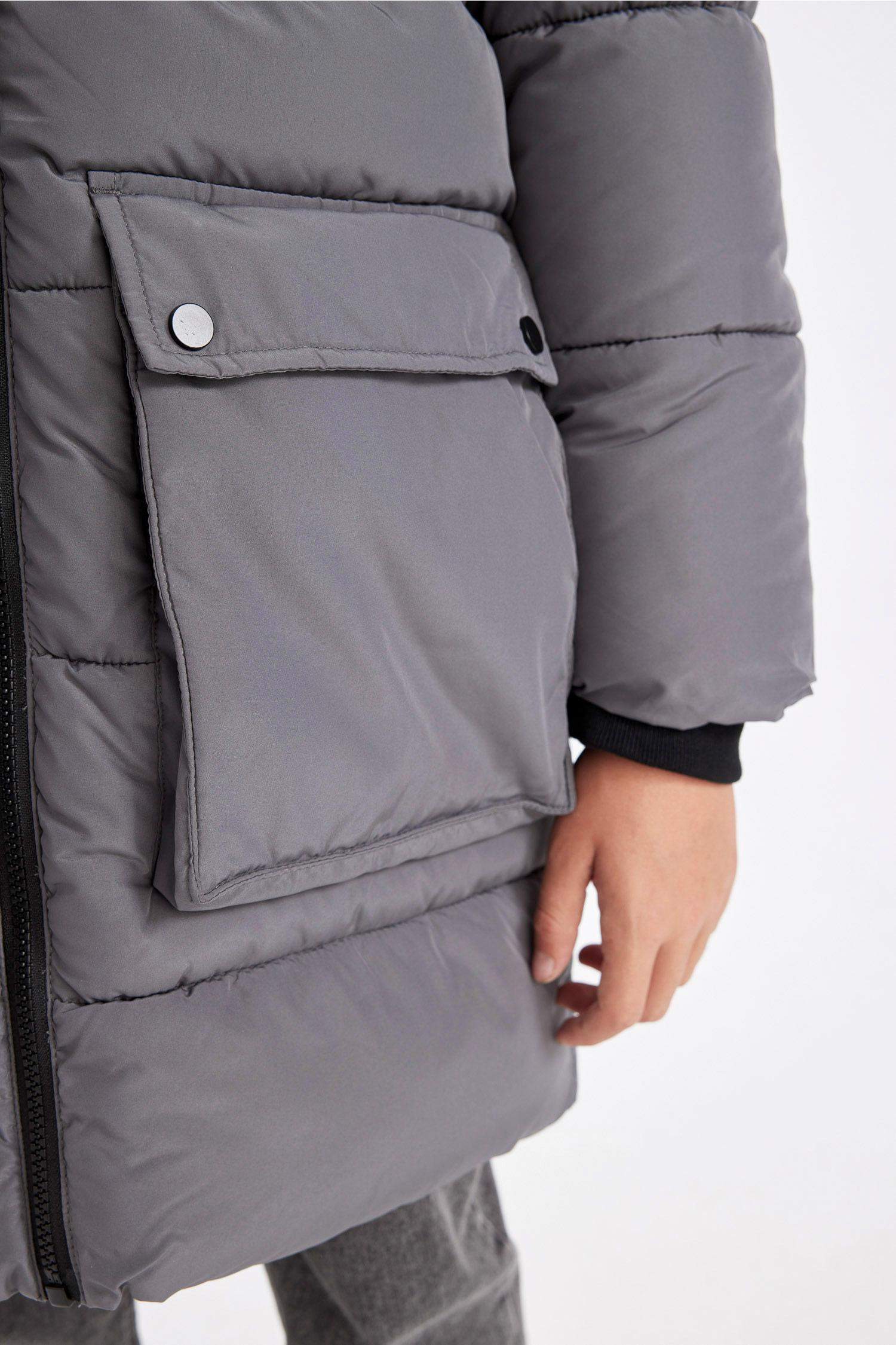 قمصلة نفخ ولادي مقاوم للماء بغطاء للرأس ببطانة فروية