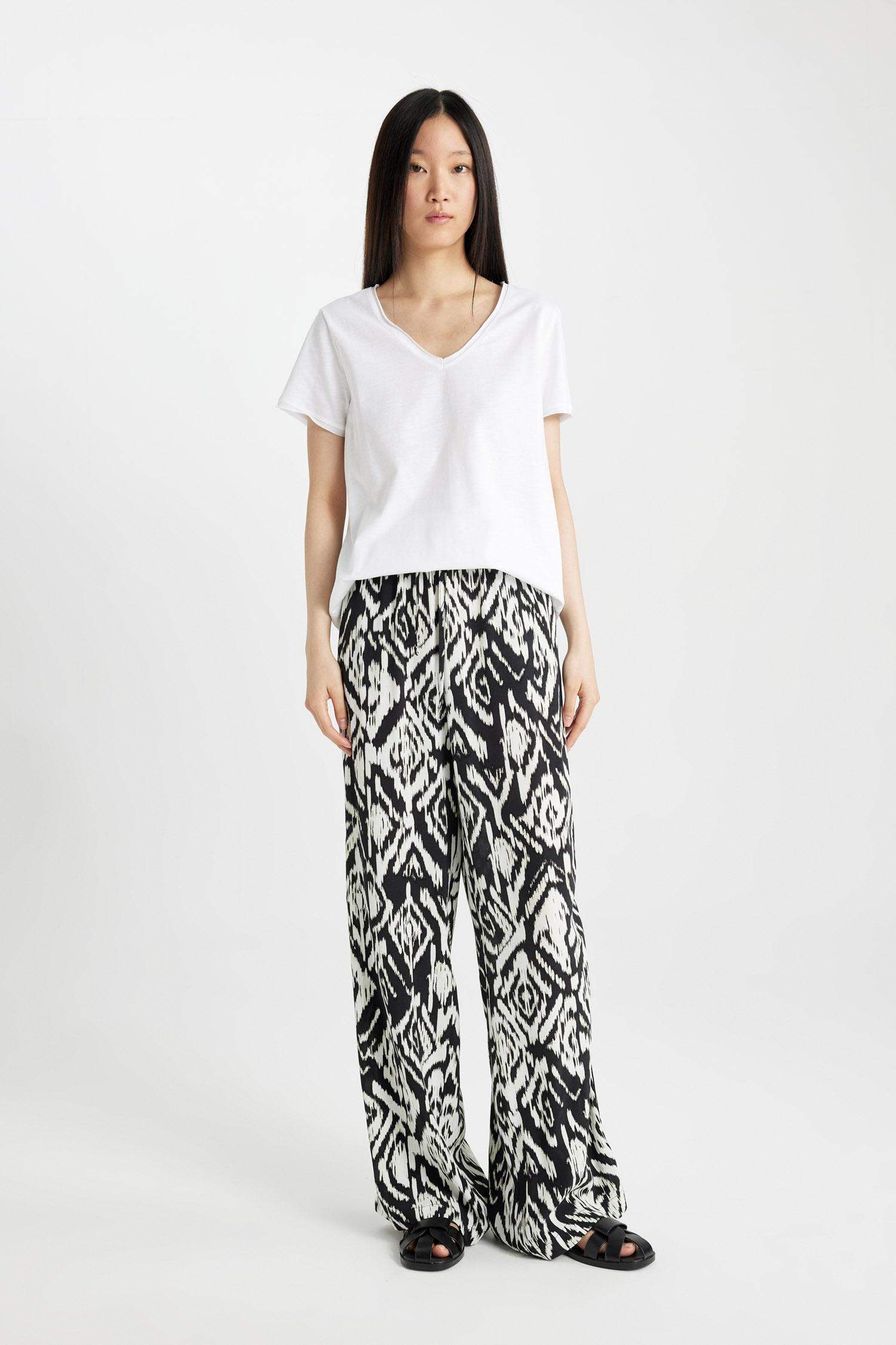 بنطرون وايد ليج برجل واسع بجيب وخصر عالي