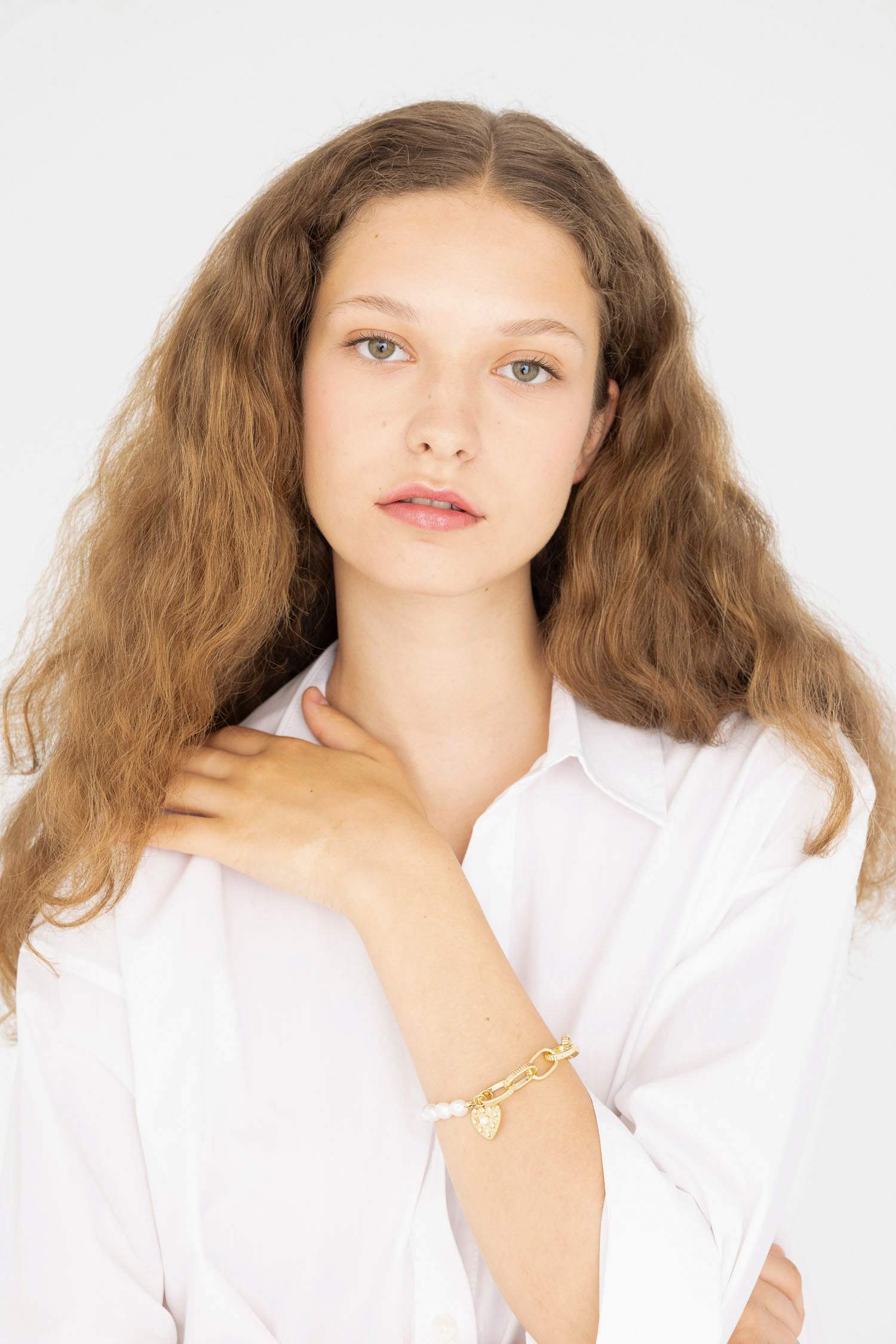 Bracelet doré avec perles et cœur pour femme