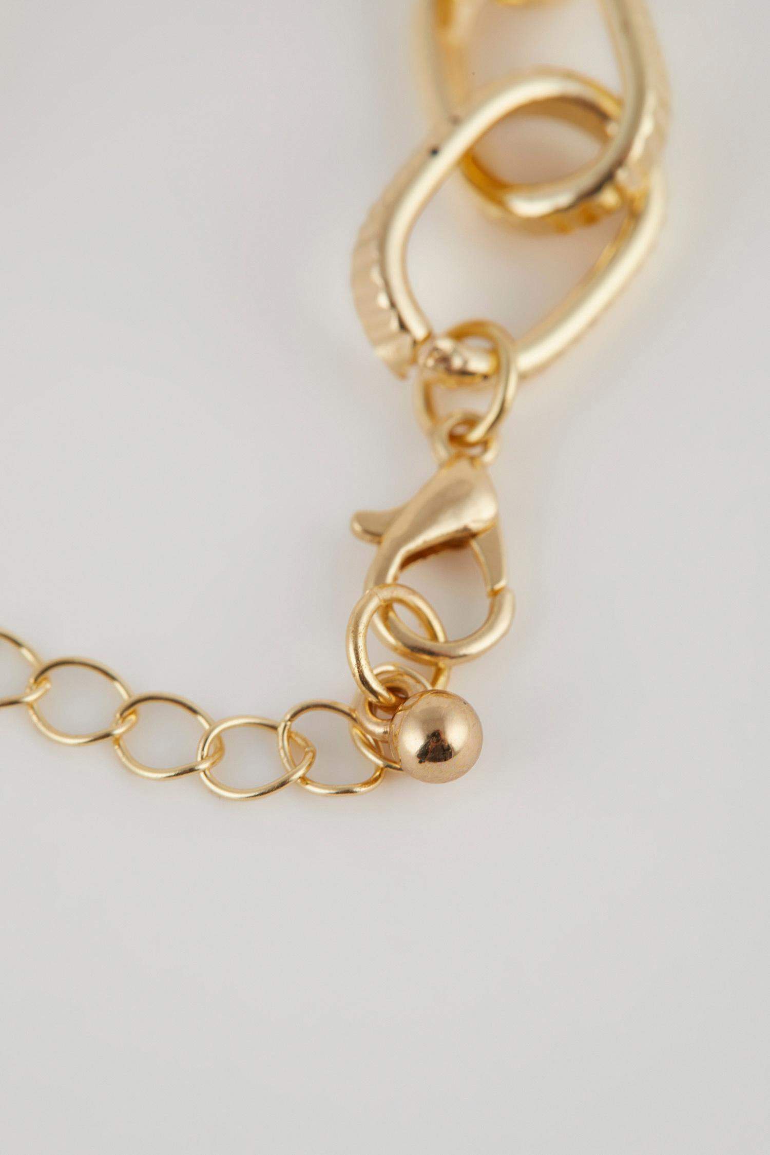 Bracelet doré avec perles et cœur pour femme