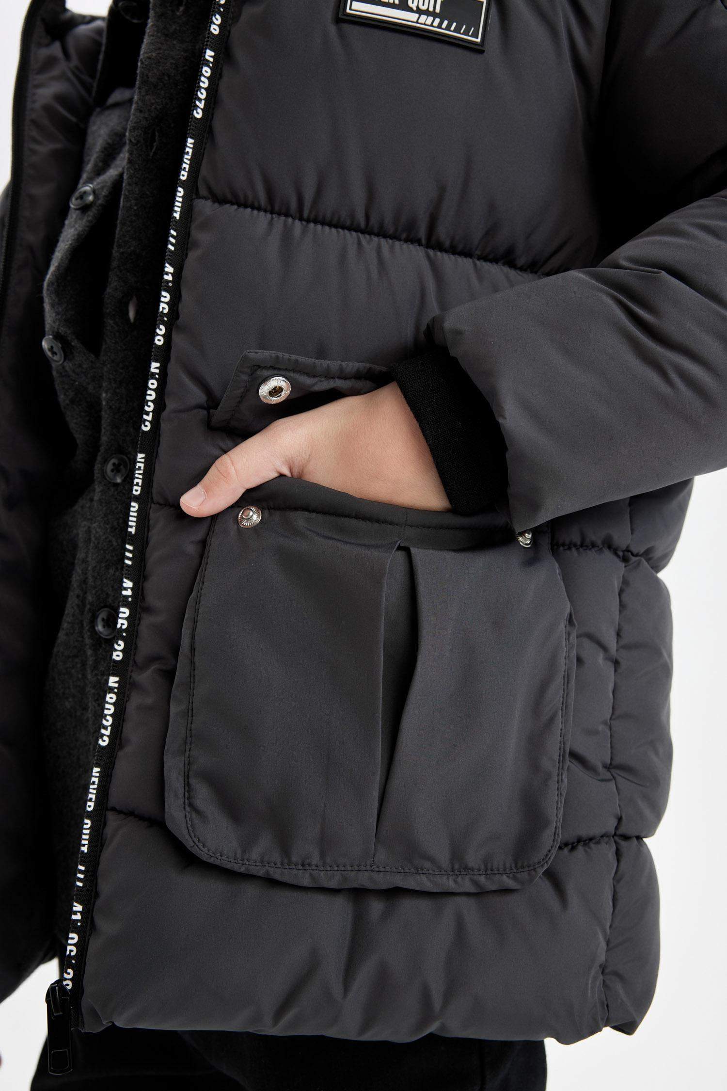 قمصلة نفخ ولادي بغطاء للرأس طارد للماء