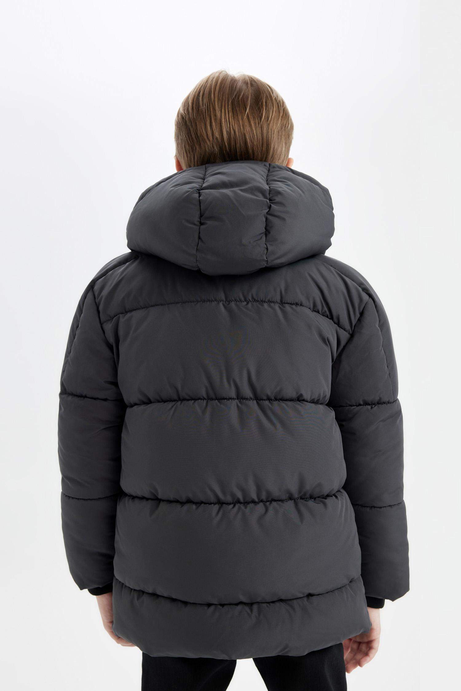 قمصلة نفخ ولادي بغطاء للرأس طارد للماء