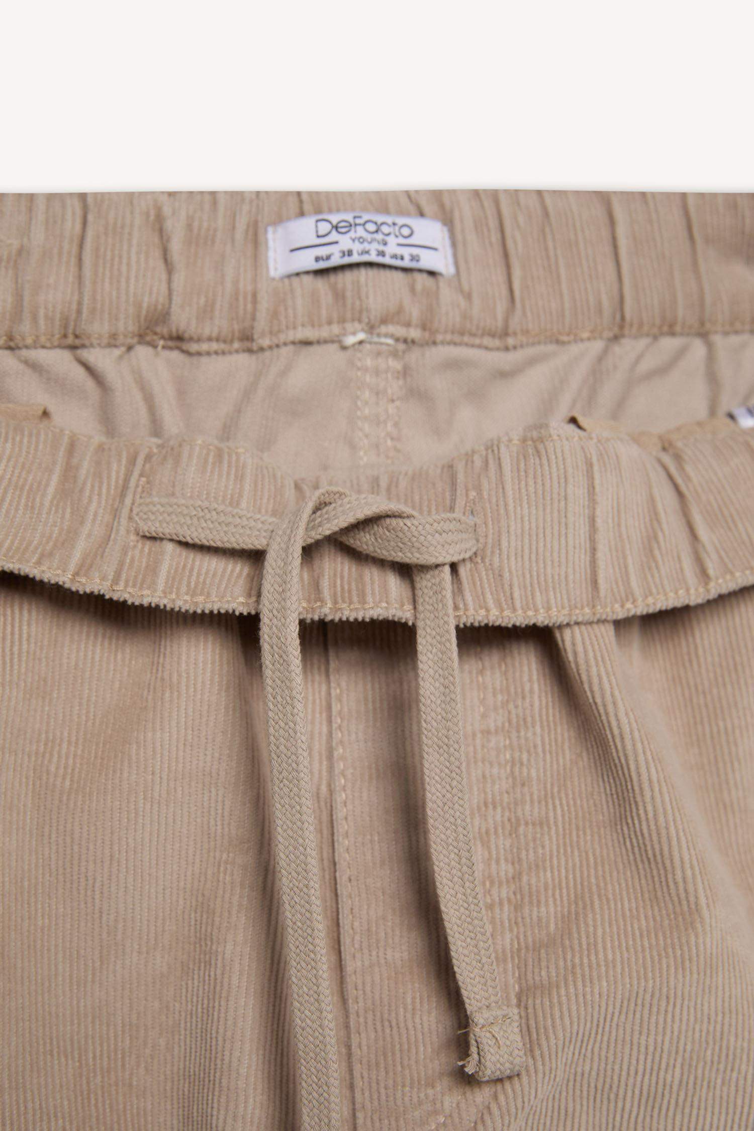 بنطلون قطيفة وايد ليج برجل واسع بجيب