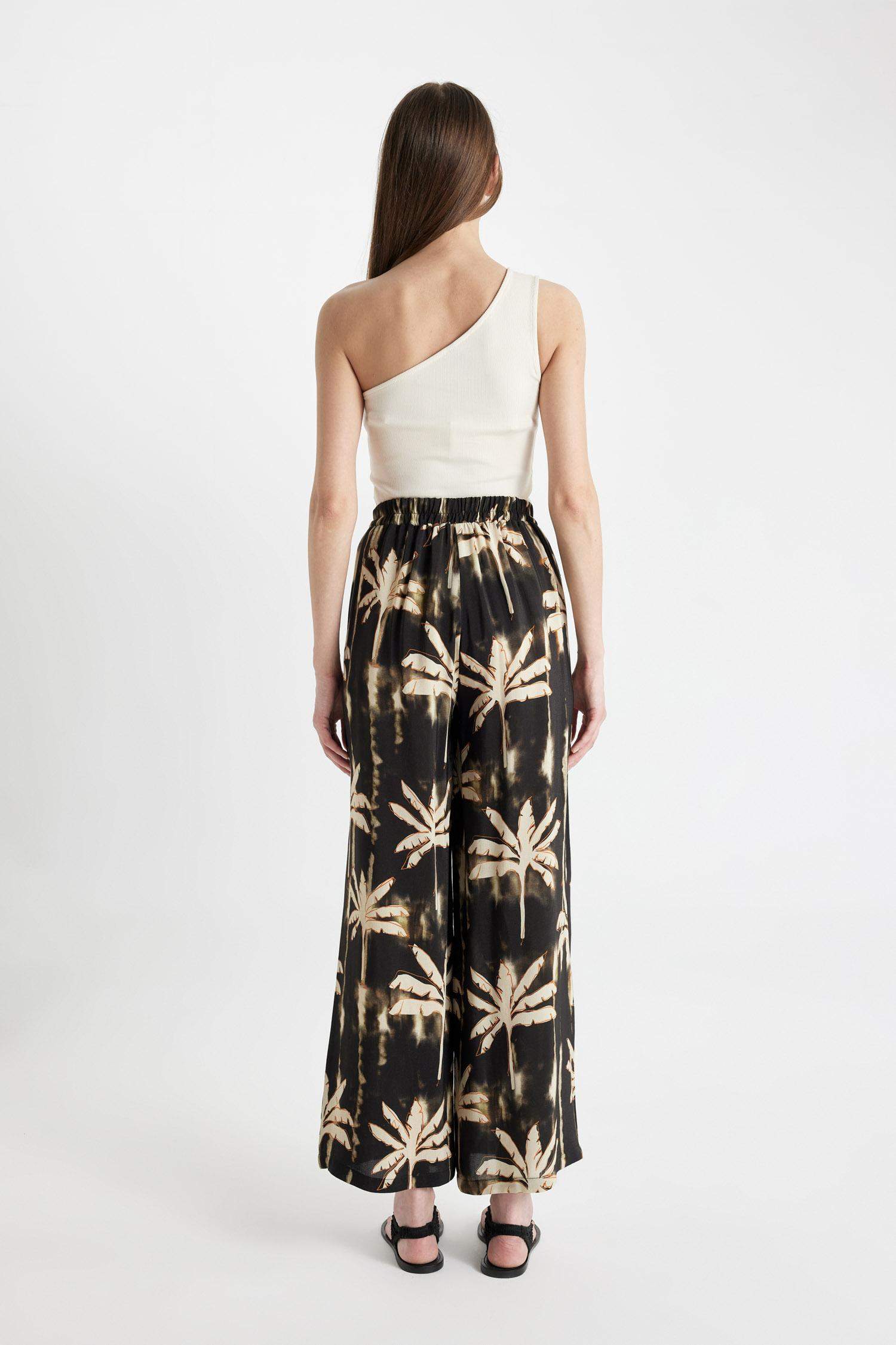 بنطرون كولوت فيت منسوج برجل واسع