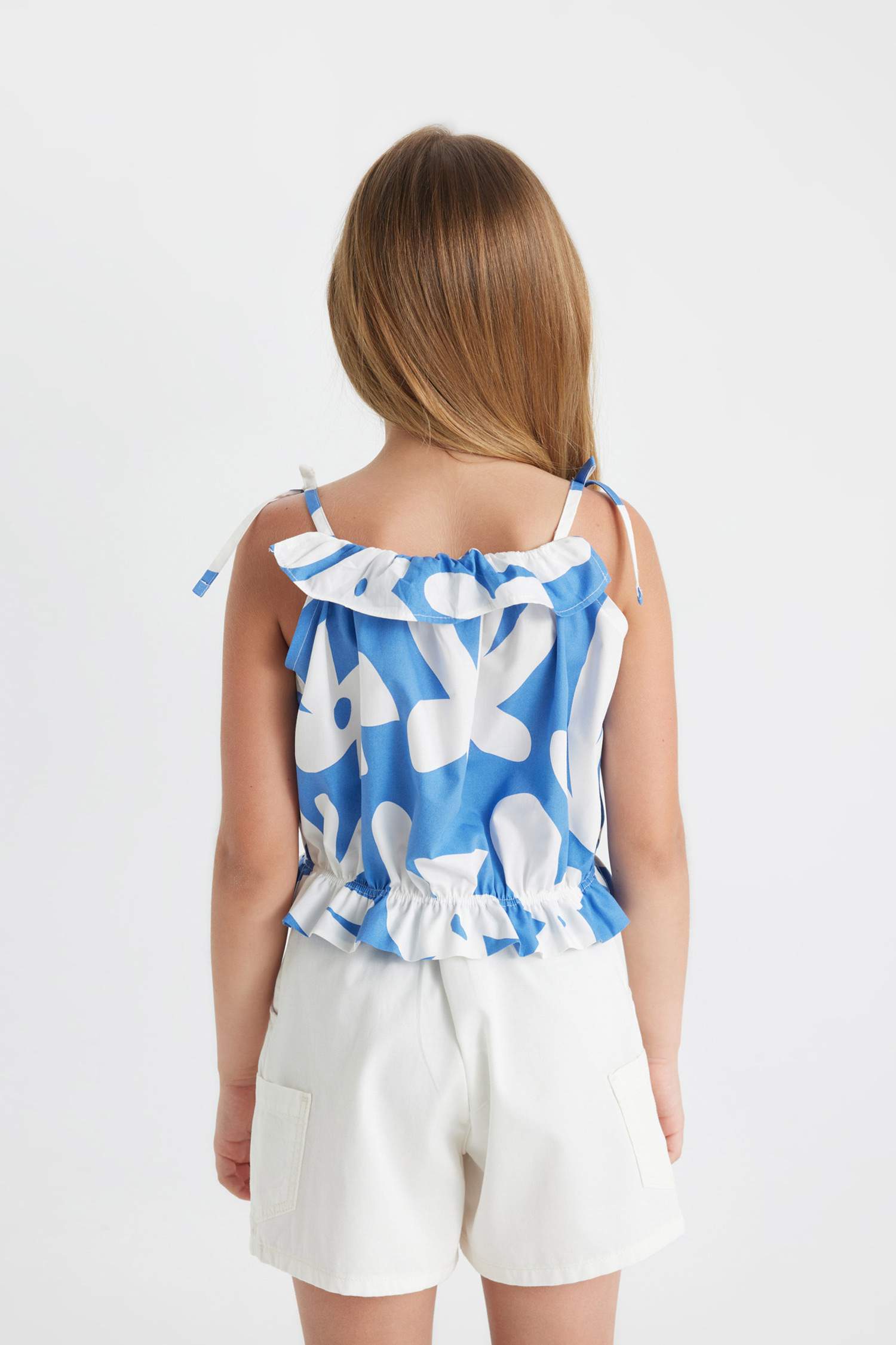 بلوزة بناتي بحمالات قصة مريحة