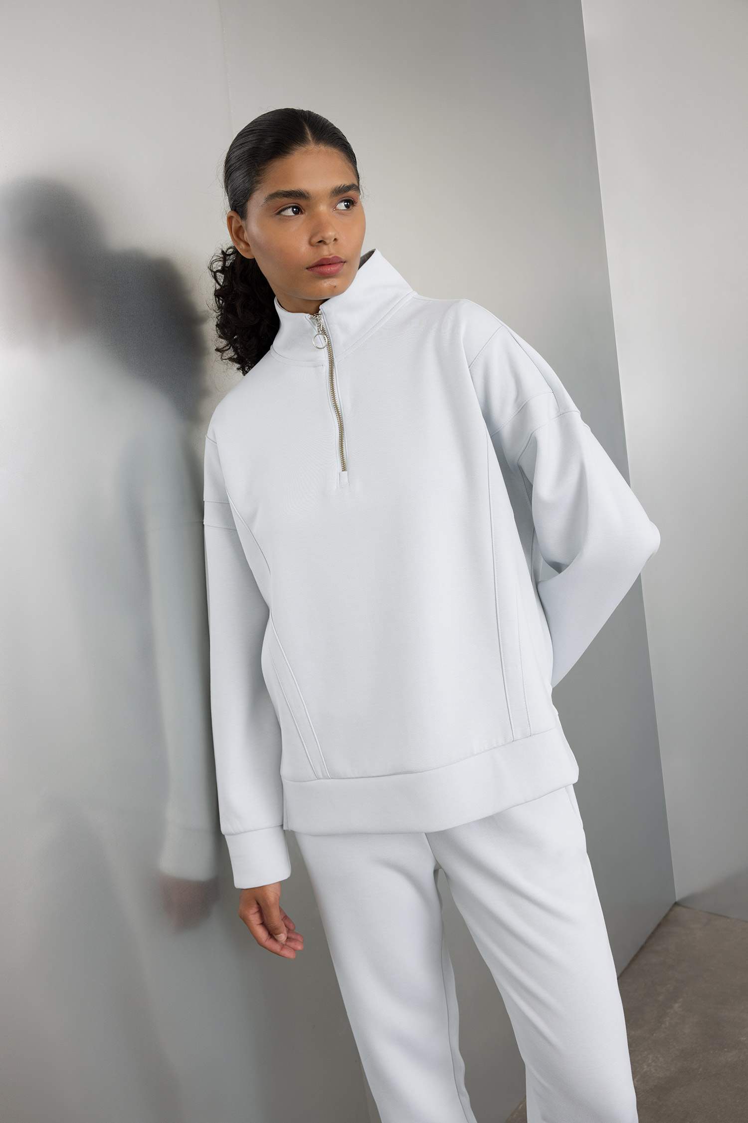 سويت شيرت رياضي اوفر سايز بياخة عالية بنصف سحاب من DeFactoFit