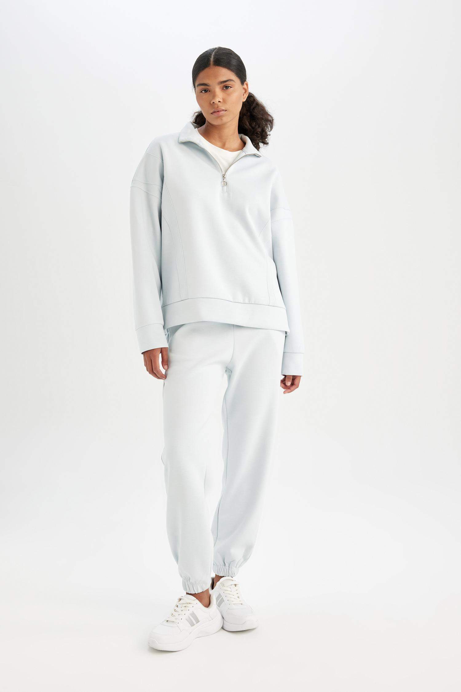 سويت شيرت رياضي اوفر سايز بياخة عالية بنصف سحاب من DeFactoFit