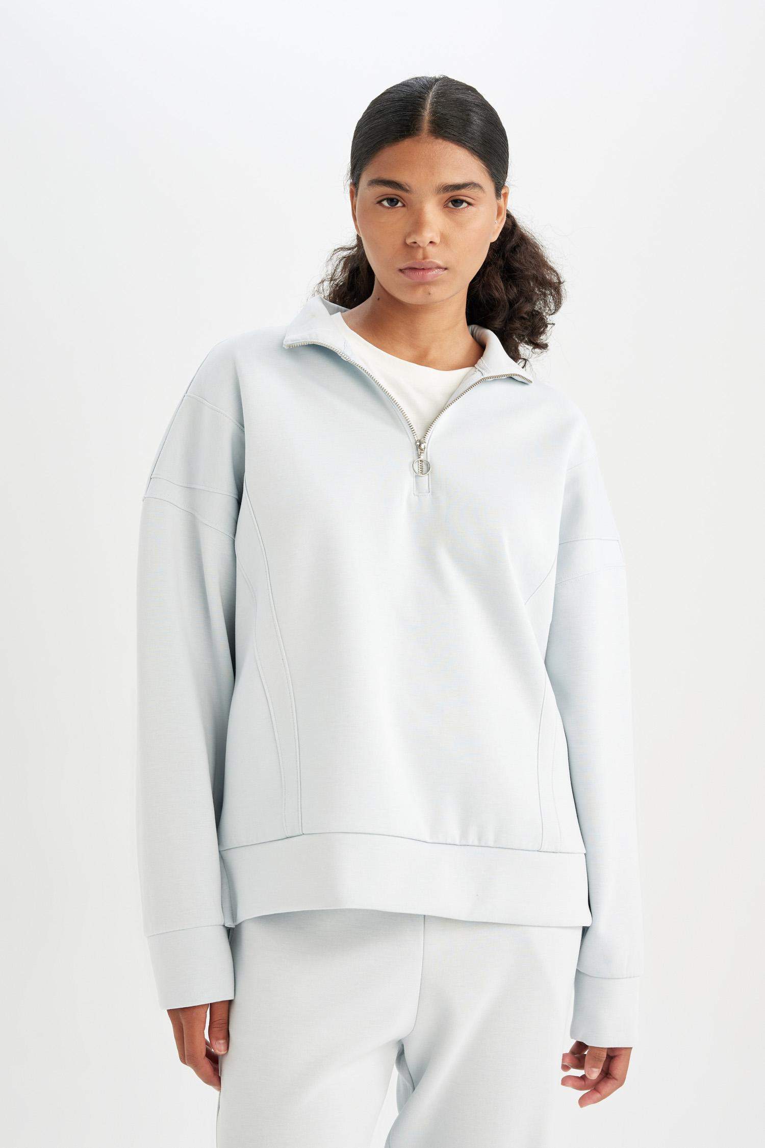 سويت شيرت رياضي اوفر سايز بياخة عالية بنصف سحاب من DeFactoFit