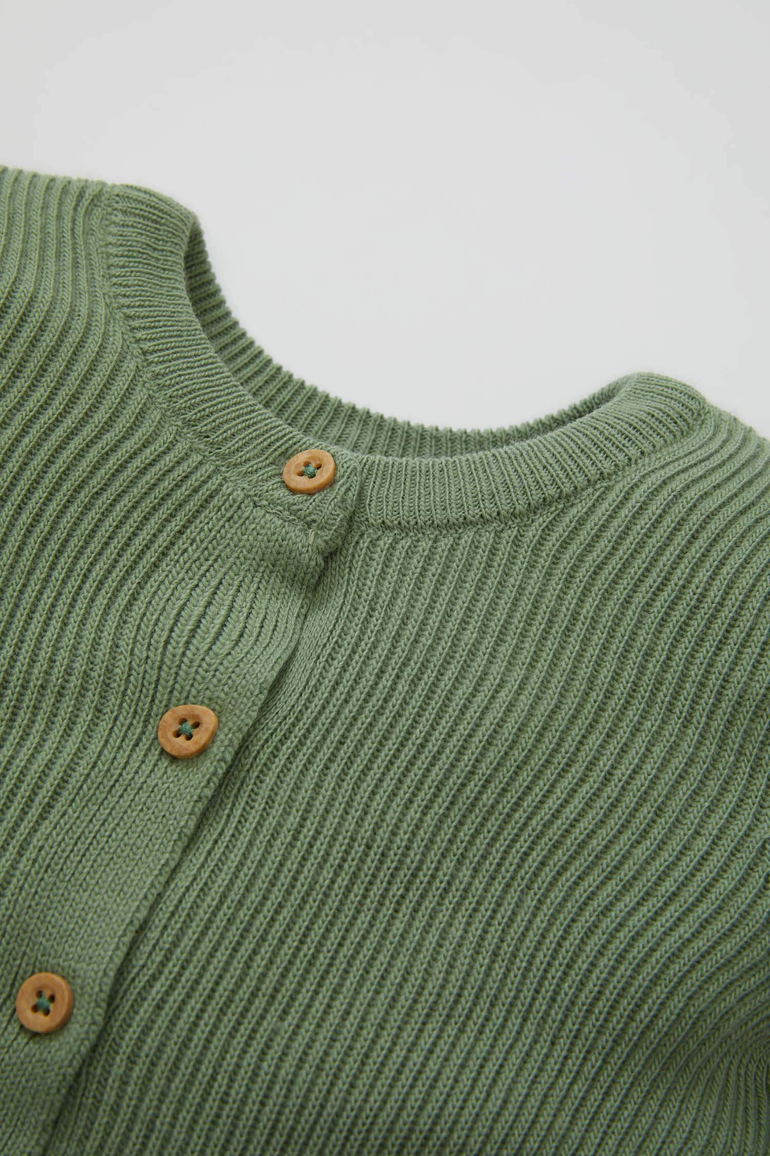 طقم تريكو بيبي اولادي كارديجان وبنطلون قصة عادية - قطعتين