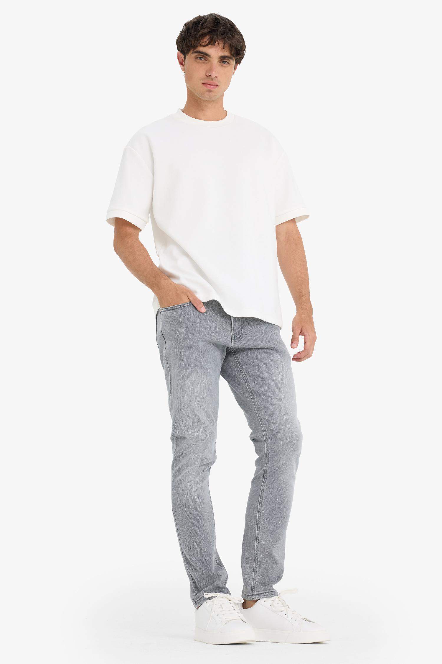 سروال جينز سليم للرجال بخصر عادي و جيوب