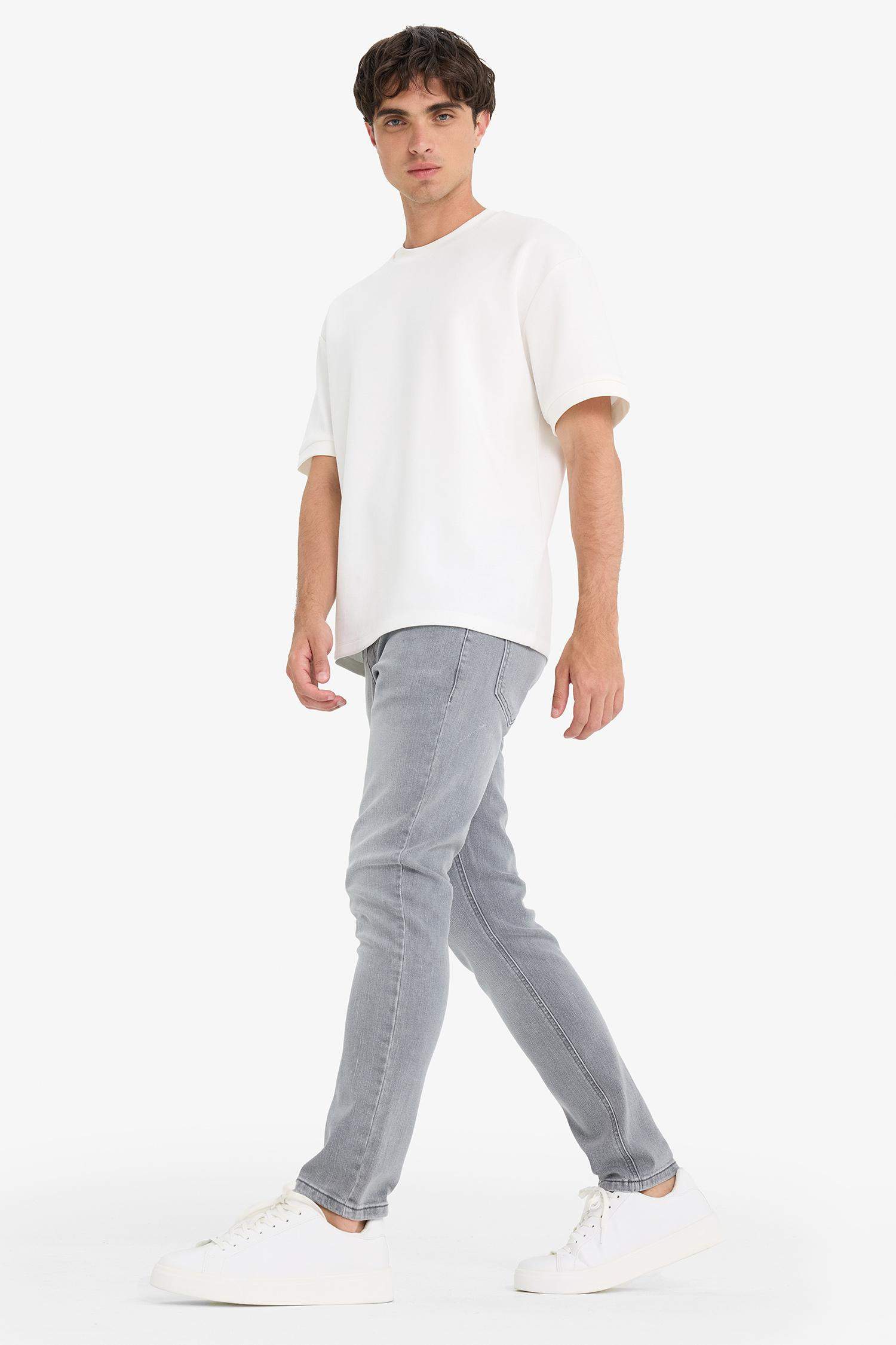 سروال جينز سليم للرجال بخصر عادي و جيوب