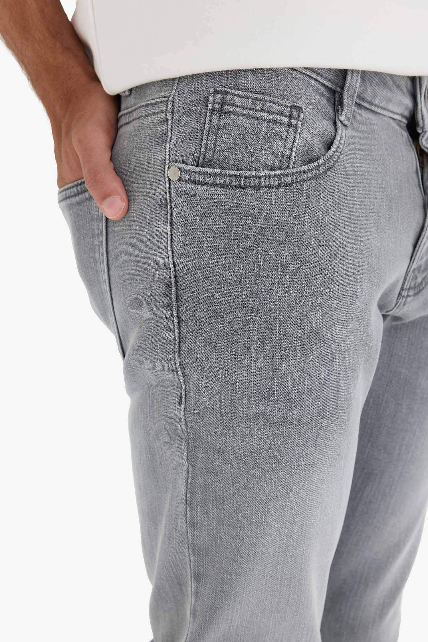 سروال جينز سليم للرجال بخصر عادي و جيوب