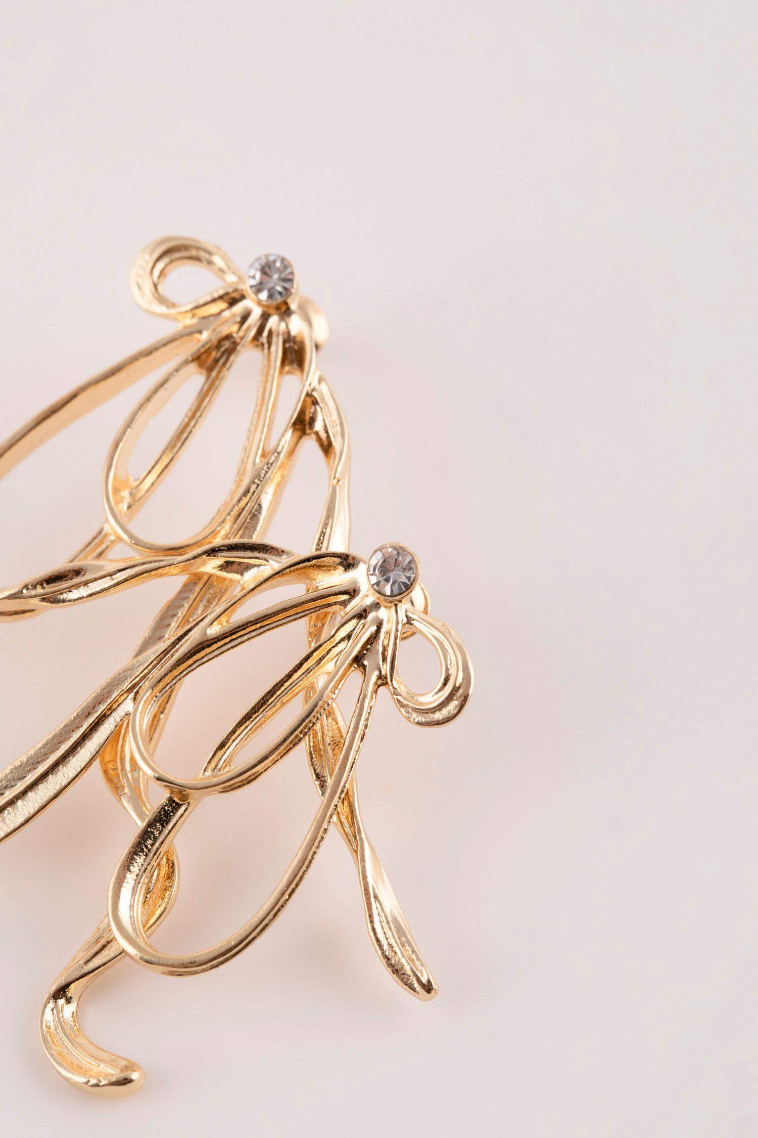 Boucles d'oreilles nœud doré pour femme