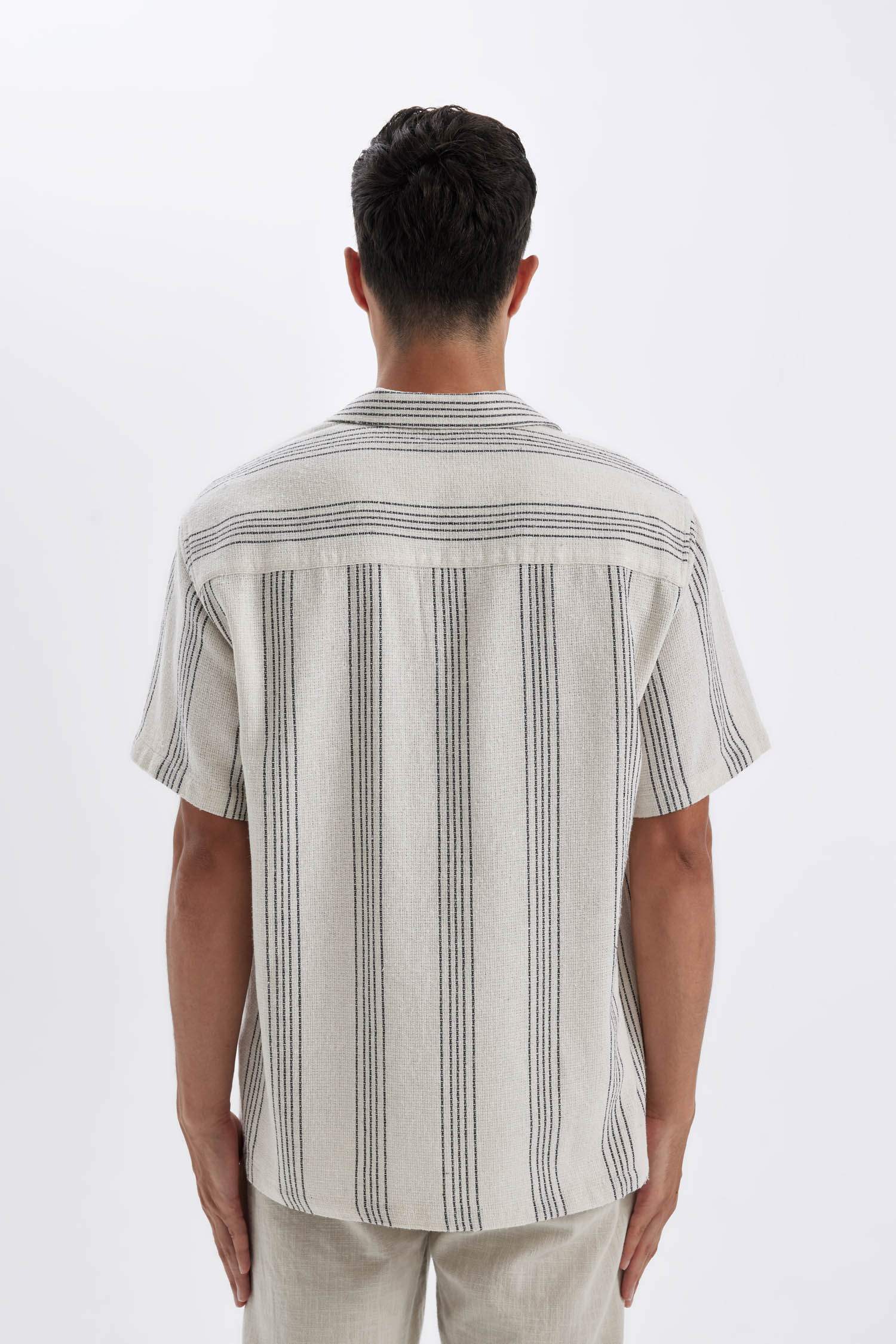 Chemise à Manches Courtes rayé à Col Polo