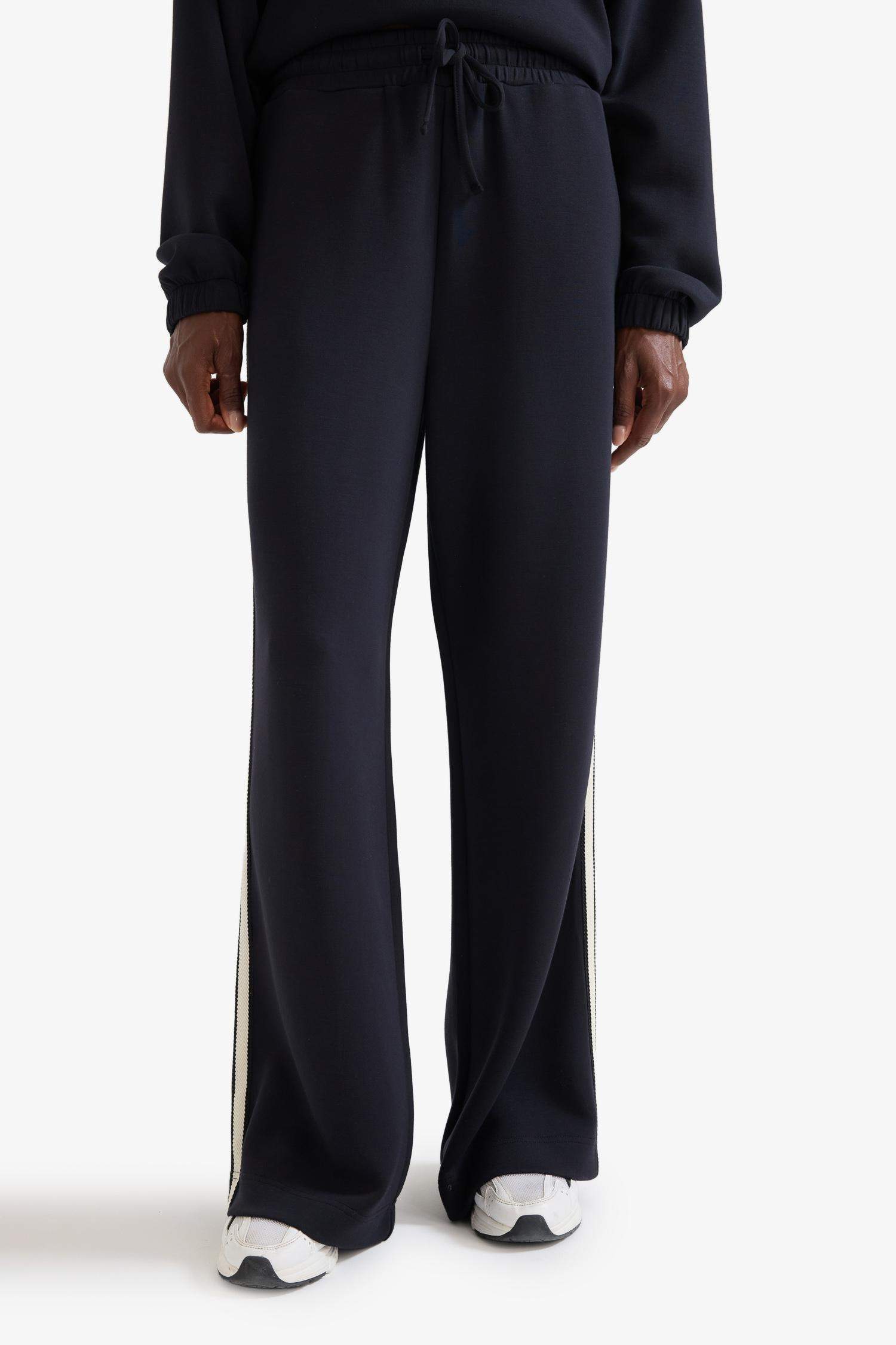 بنطلون نسيج مشروط وايد ليج برجل واسع بجيب